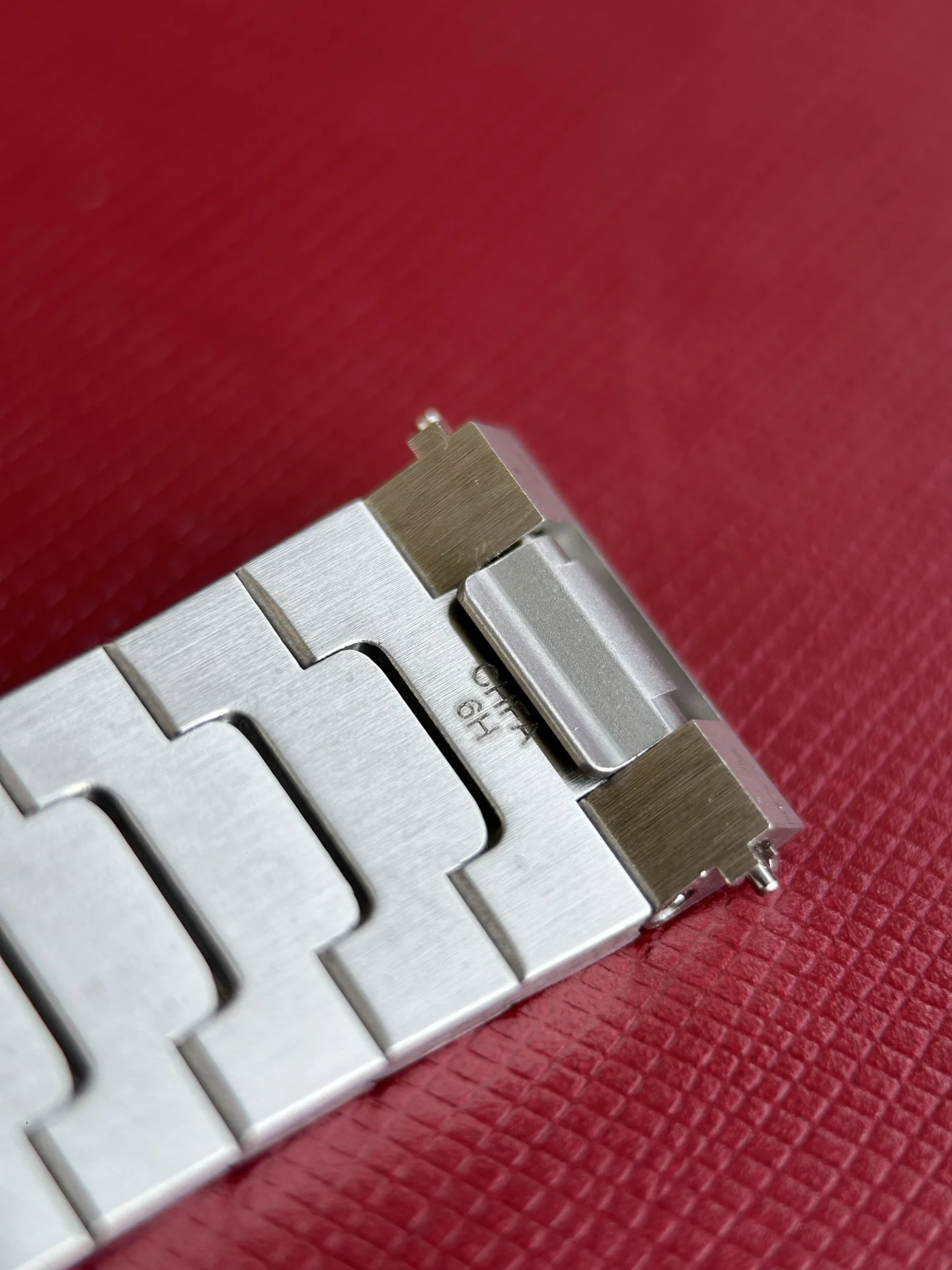 Quick-release steel bracelet details — photographed off the sweep