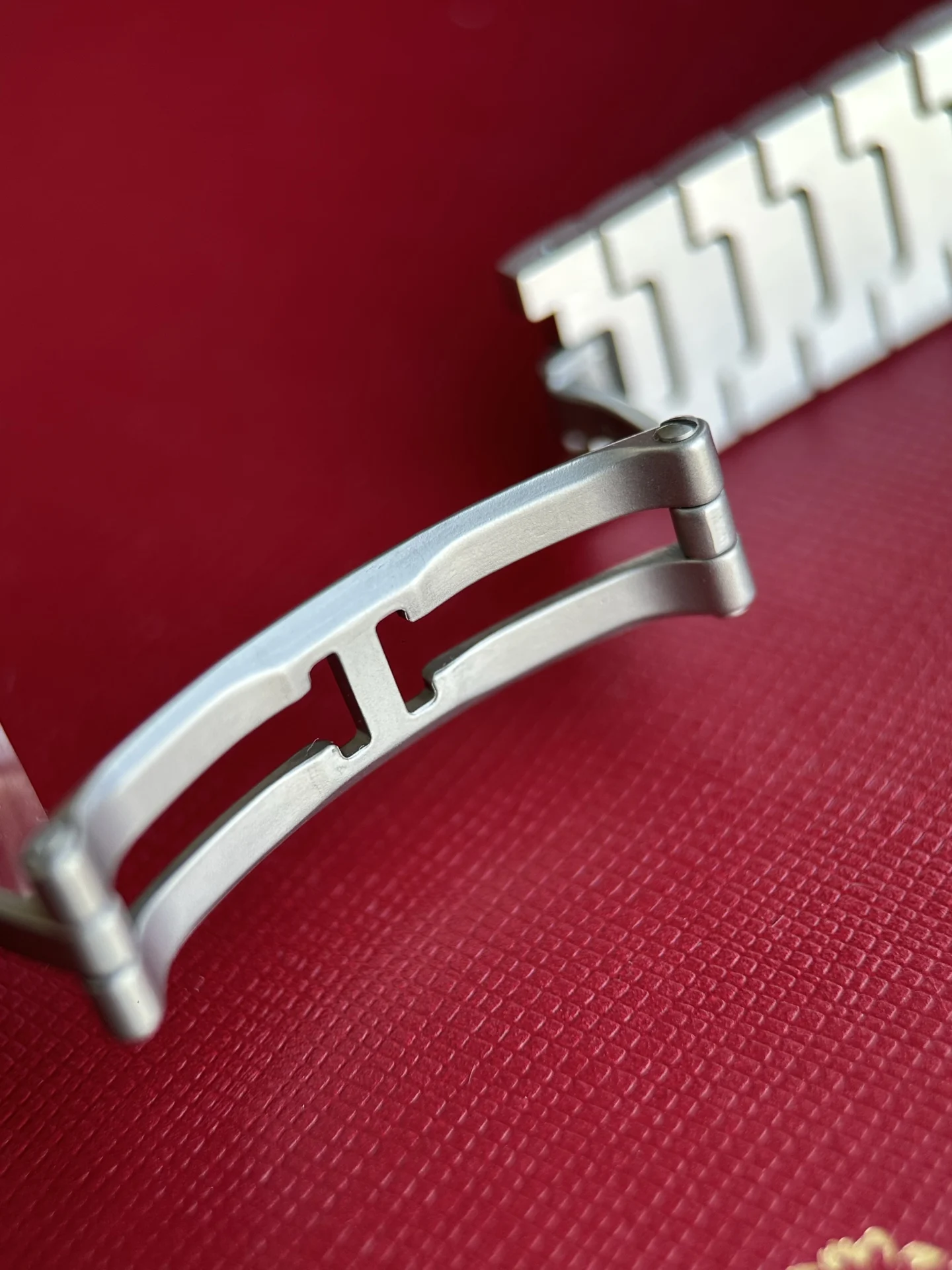 Quick-release steel bracelet details — photographed off the sweep