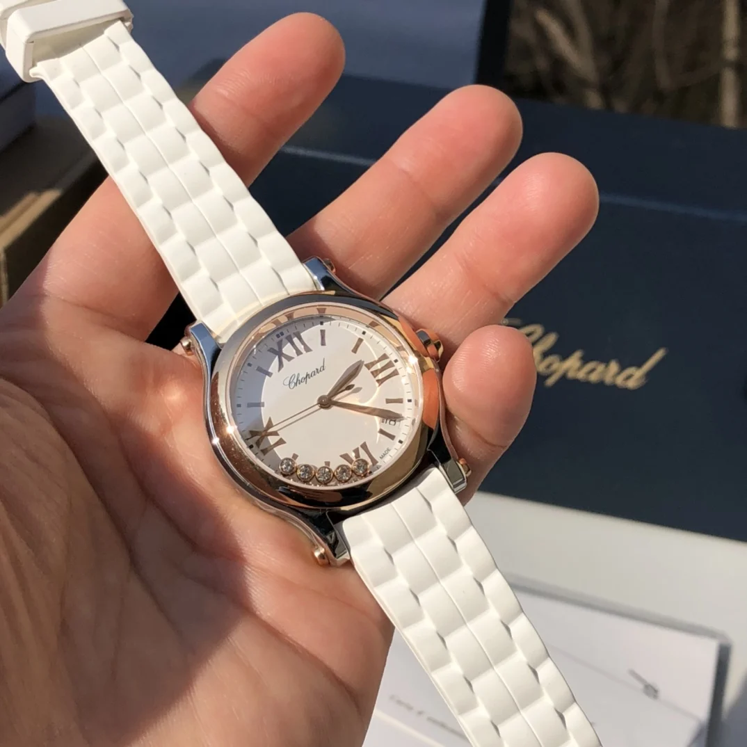 Reference 278582-6001: 18k rose gold + stainless steel (white — photographed off the sweep