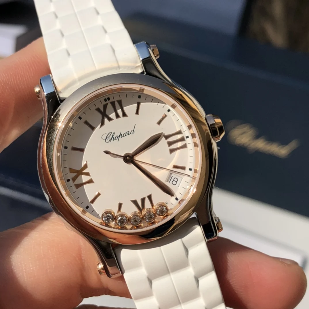 Reference 278582-6001: 18k rose gold + stainless steel (white — photographed off the sweep
