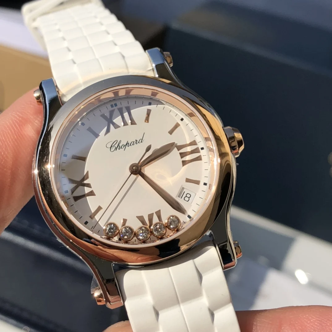 Reference 278582-6001: 18k rose gold + stainless steel (white — photographed off the sweep