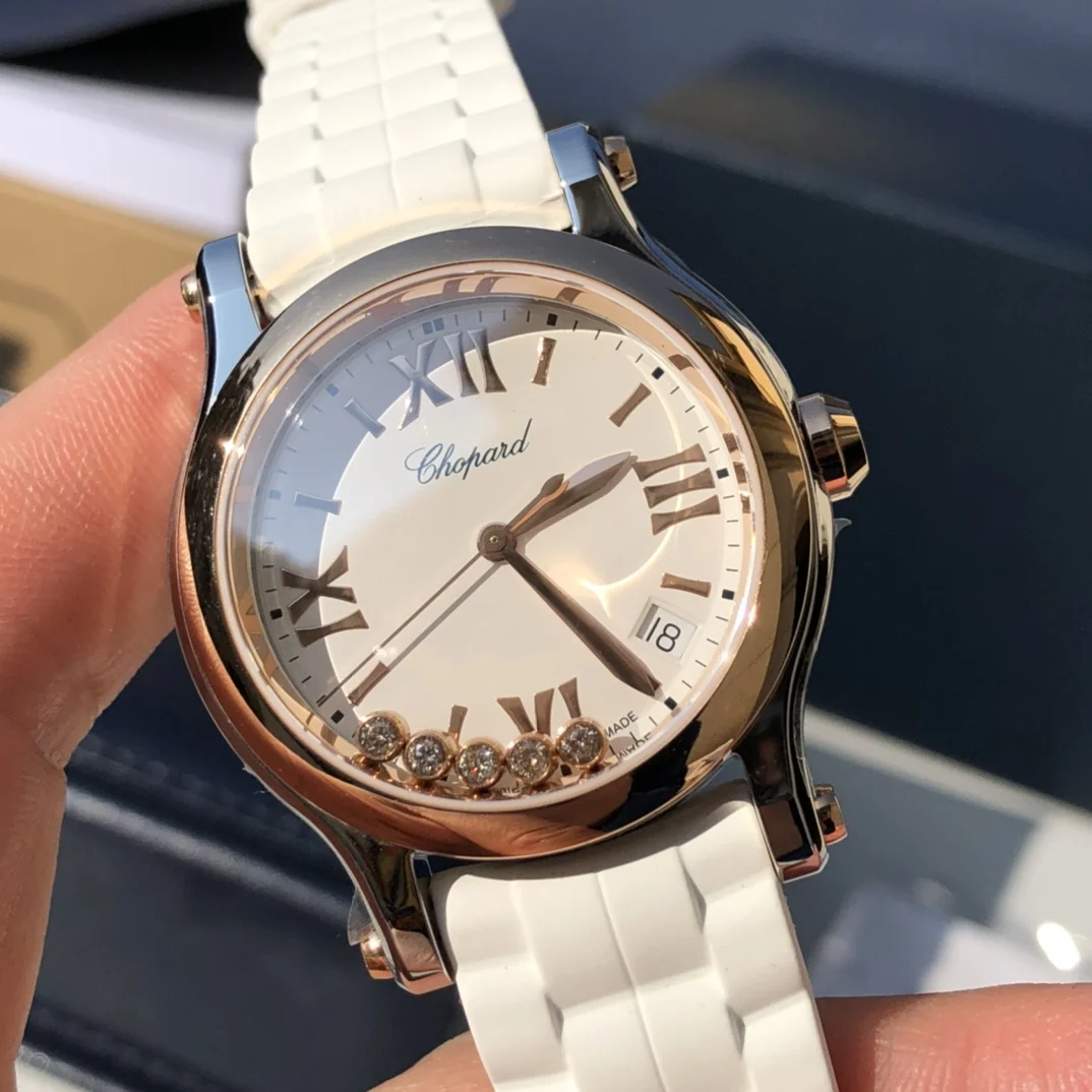 Reference 278582-6001: 18k rose gold + stainless steel (white — photographed off the sweep