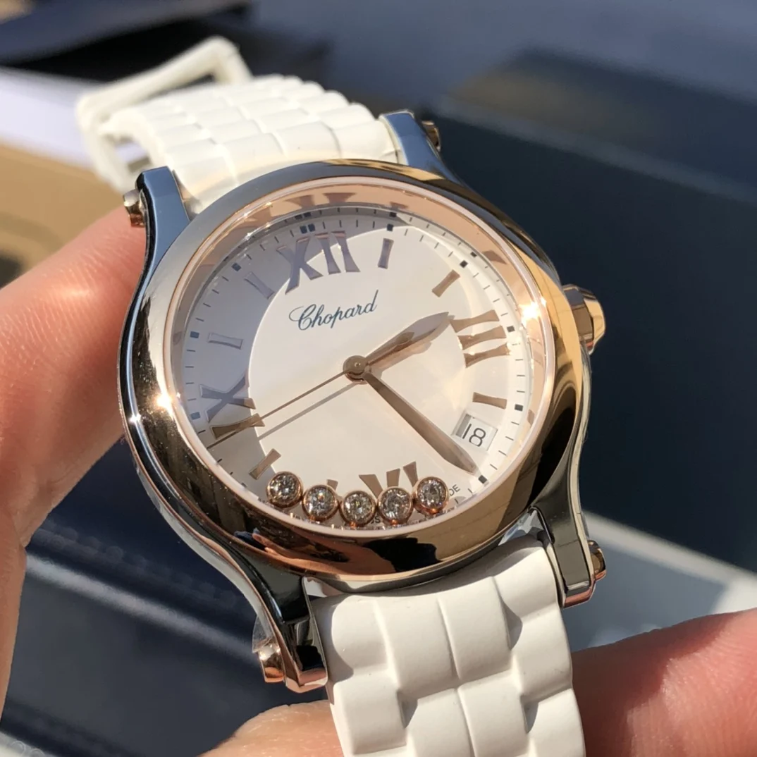Reference 278582-6001: 18k rose gold + stainless steel (white — photographed off the sweep