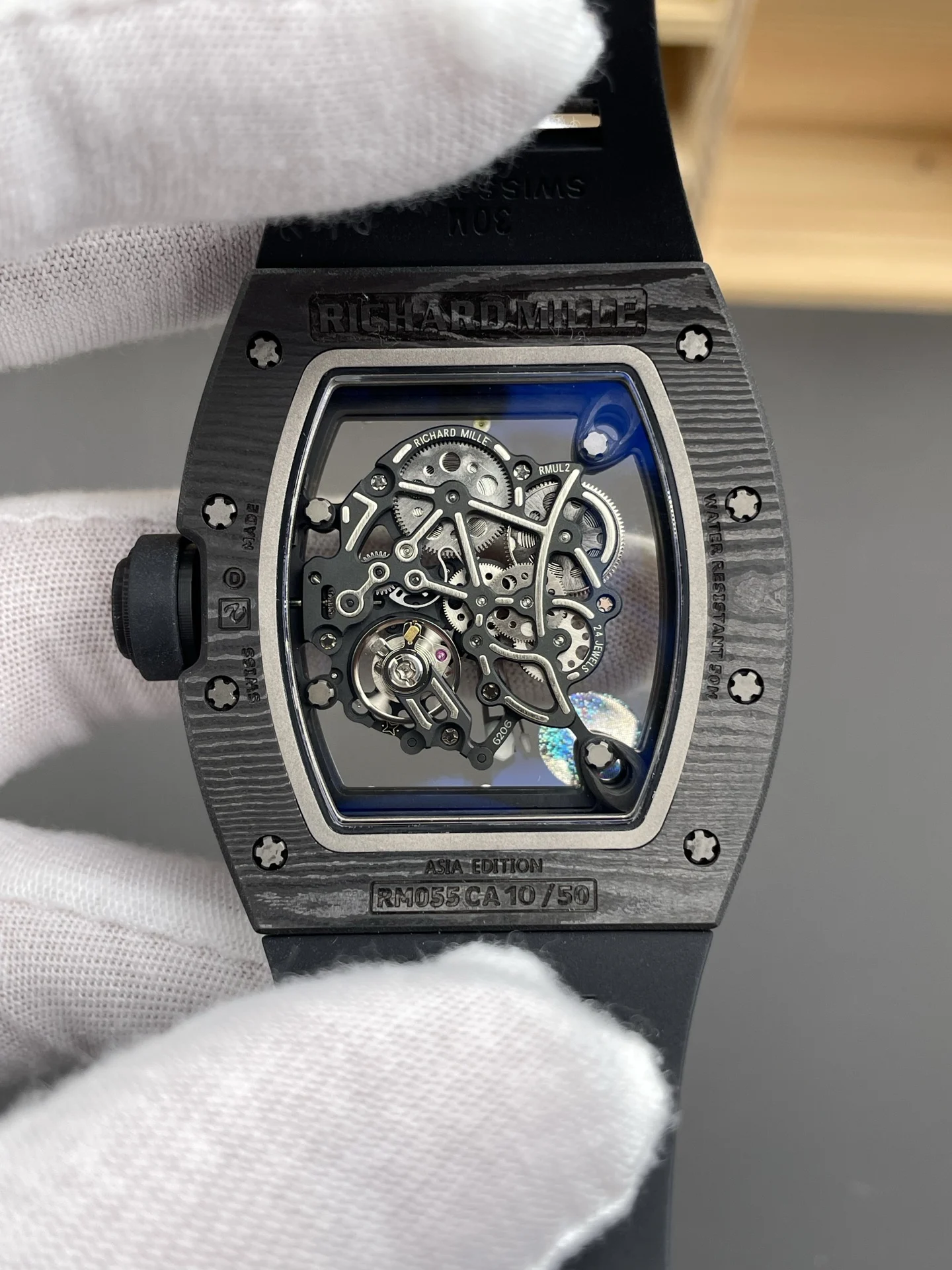 Richard Mille RM Carbon Black Dial RM 055 49.9 × 42.7mm — photographed off the sweep