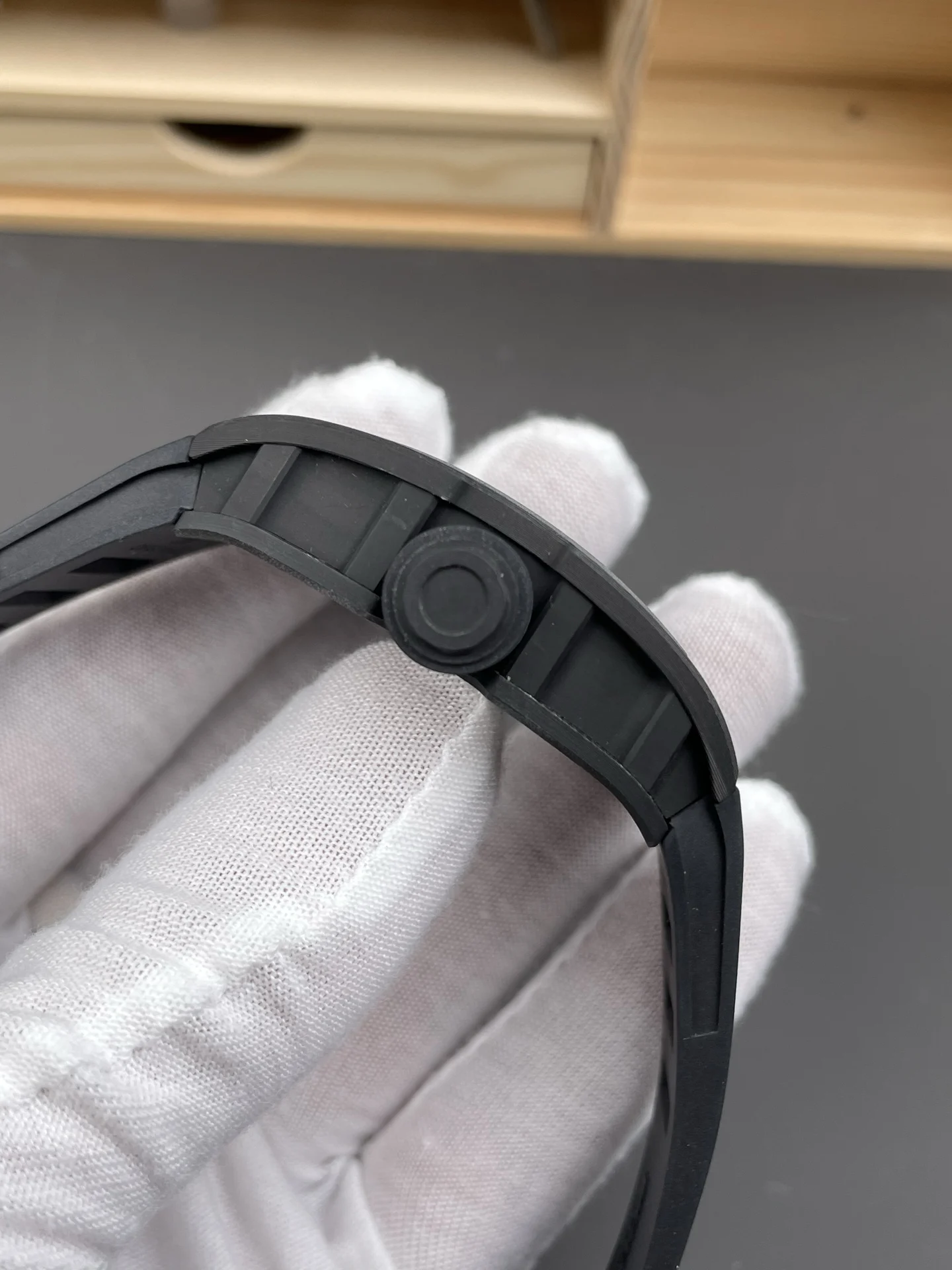 Richard Mille RM Carbon Black Dial RM 055 49.9 × 42.7mm — photographed off the sweep