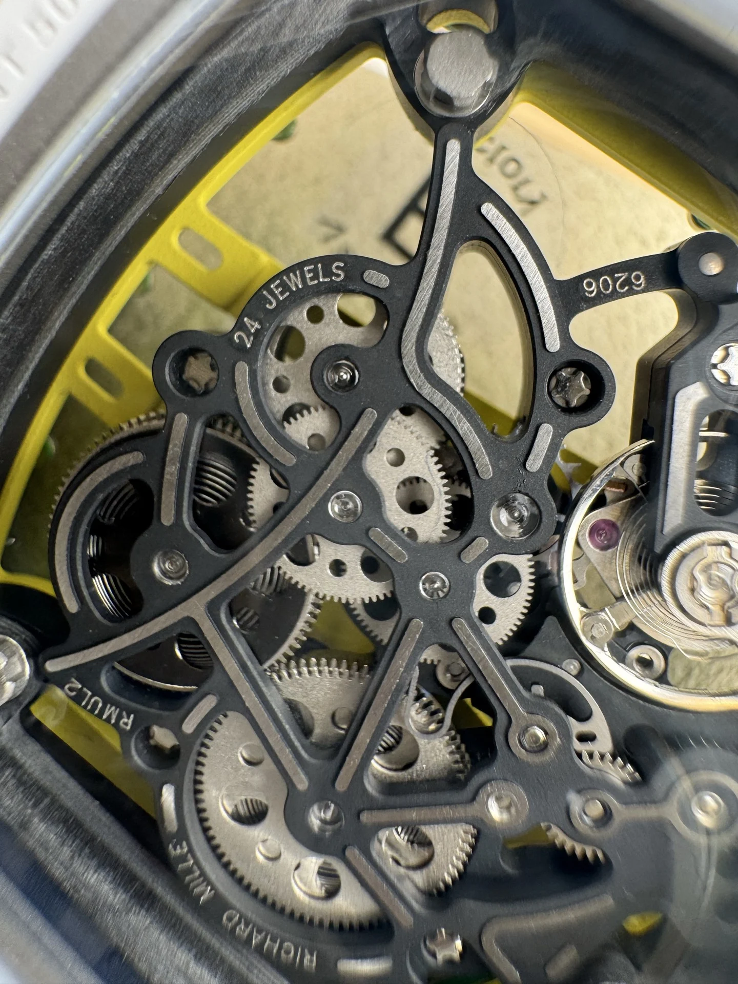 Richard Mille RM Ceramic Green Dial RM 61-01 51 × 42mm — photographed off the sweep