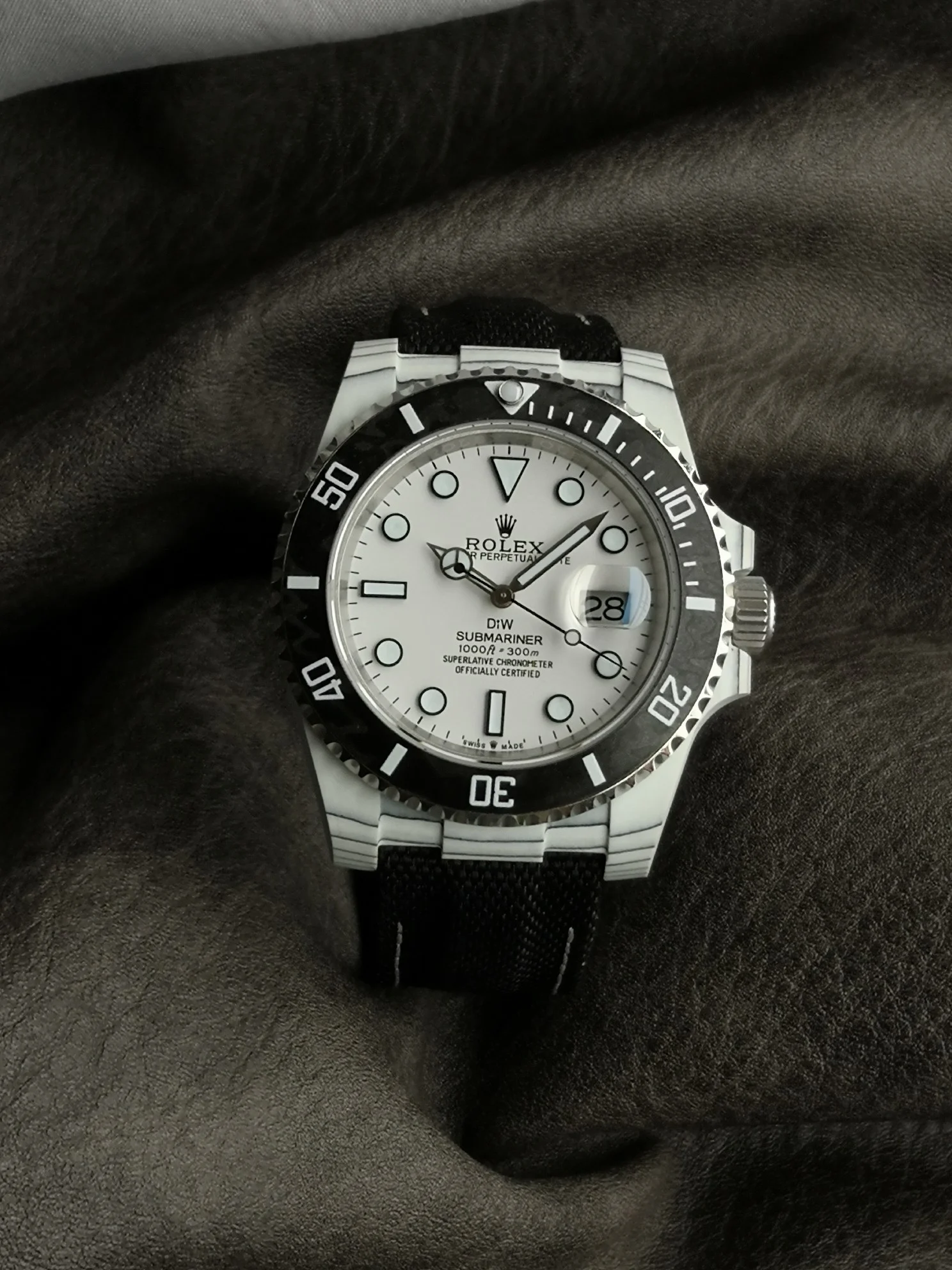 Rolex Carbon — photographed off the sweep