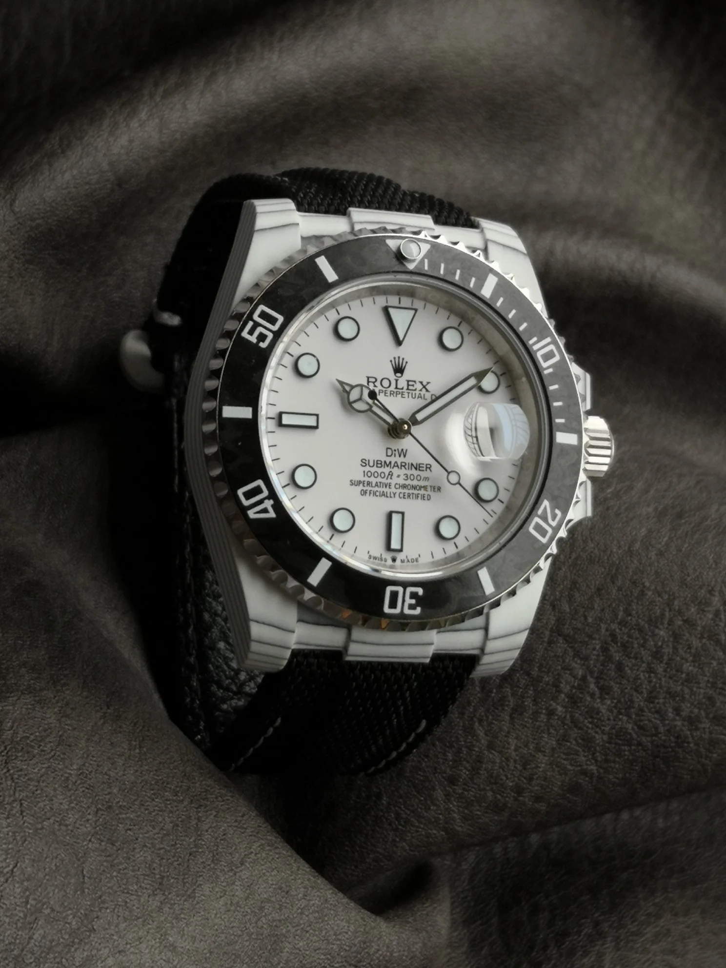 Rolex Carbon — photographed off the sweep