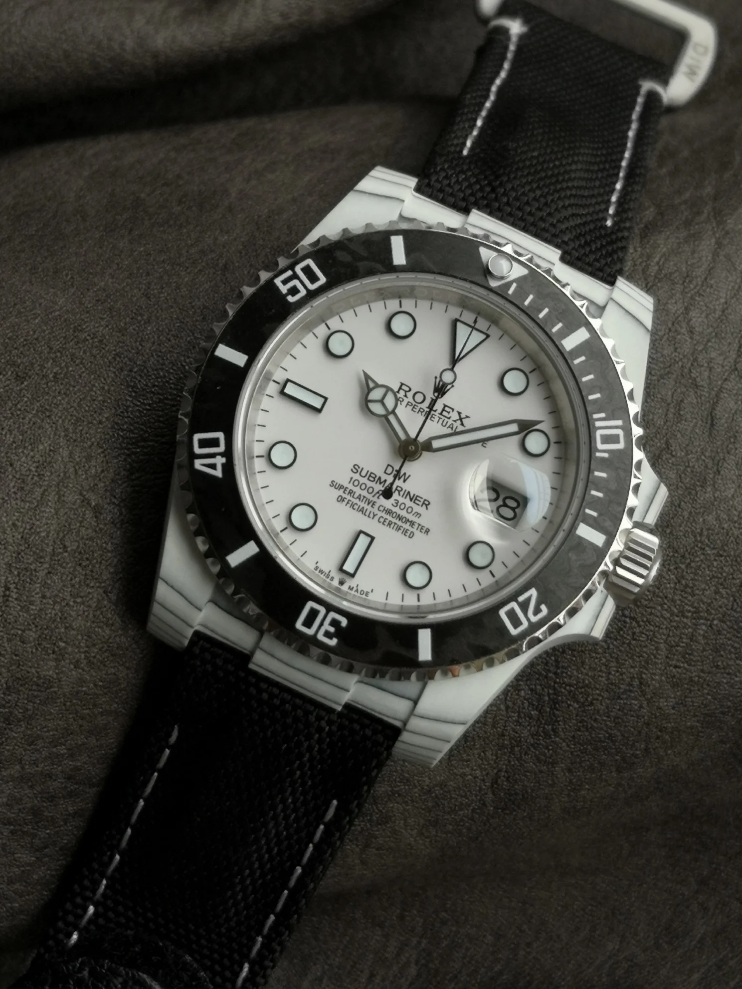 Rolex Carbon — photographed off the sweep