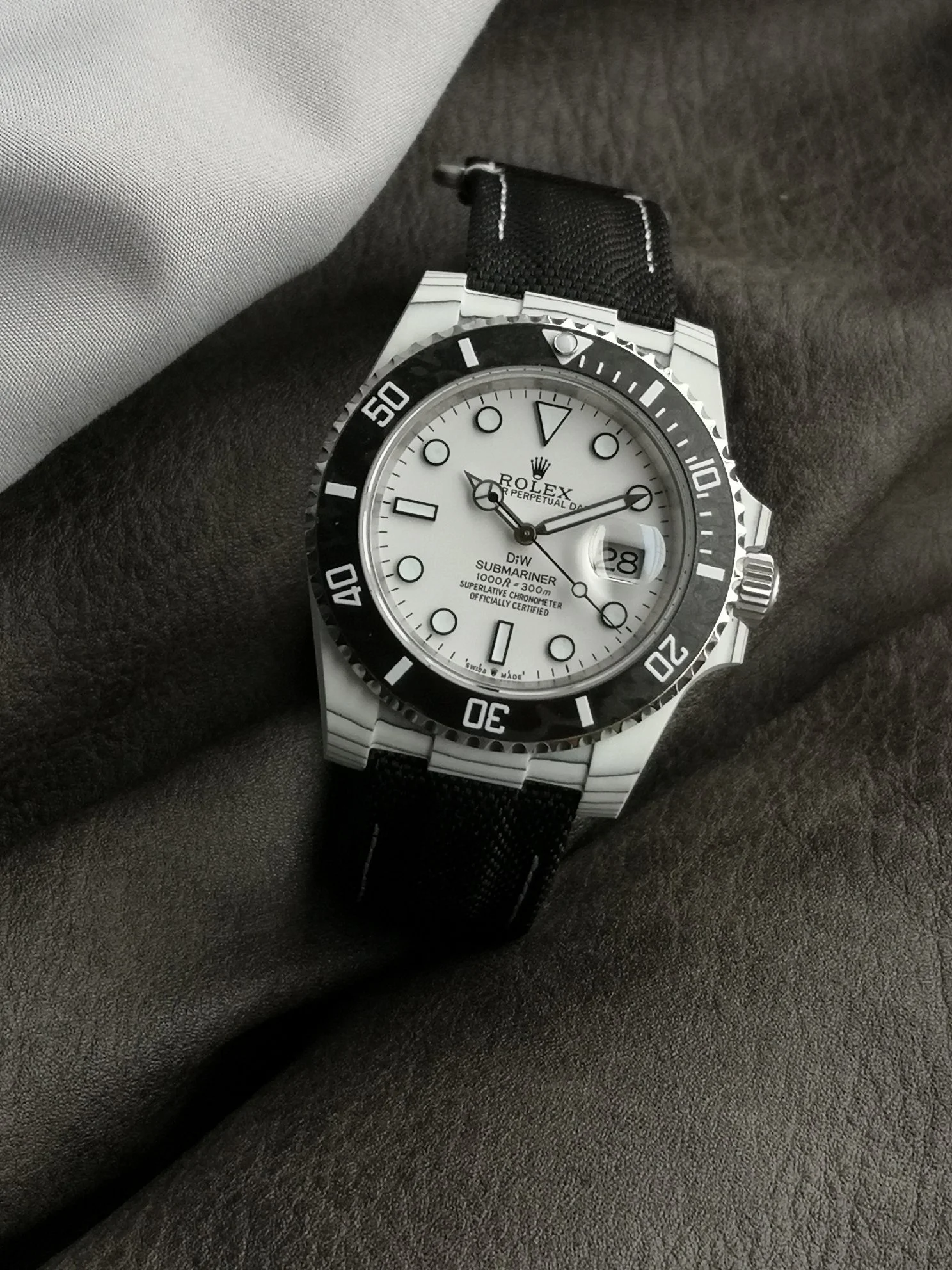 Rolex Carbon — photographed off the sweep