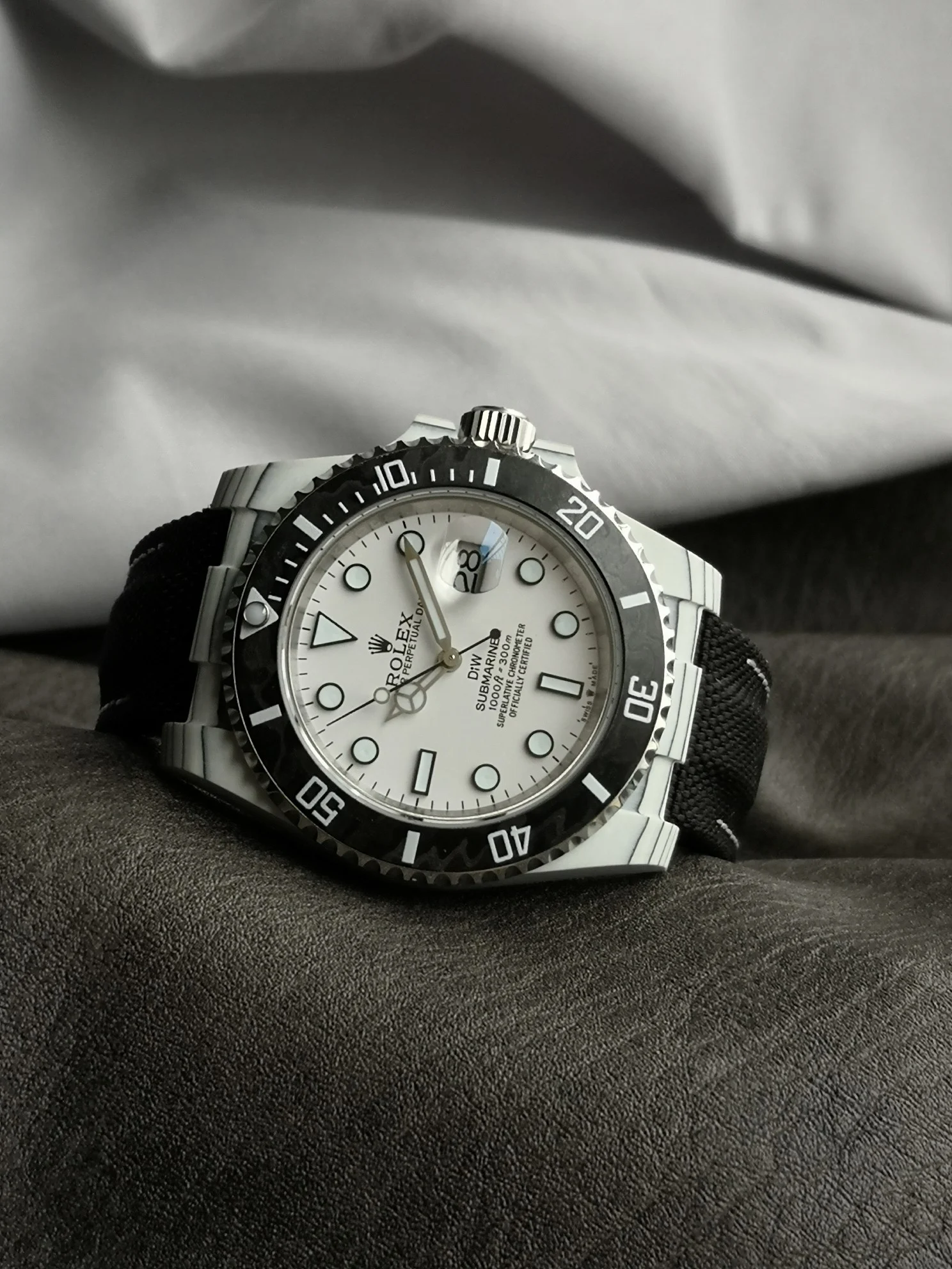 Rolex Carbon — photographed off the sweep