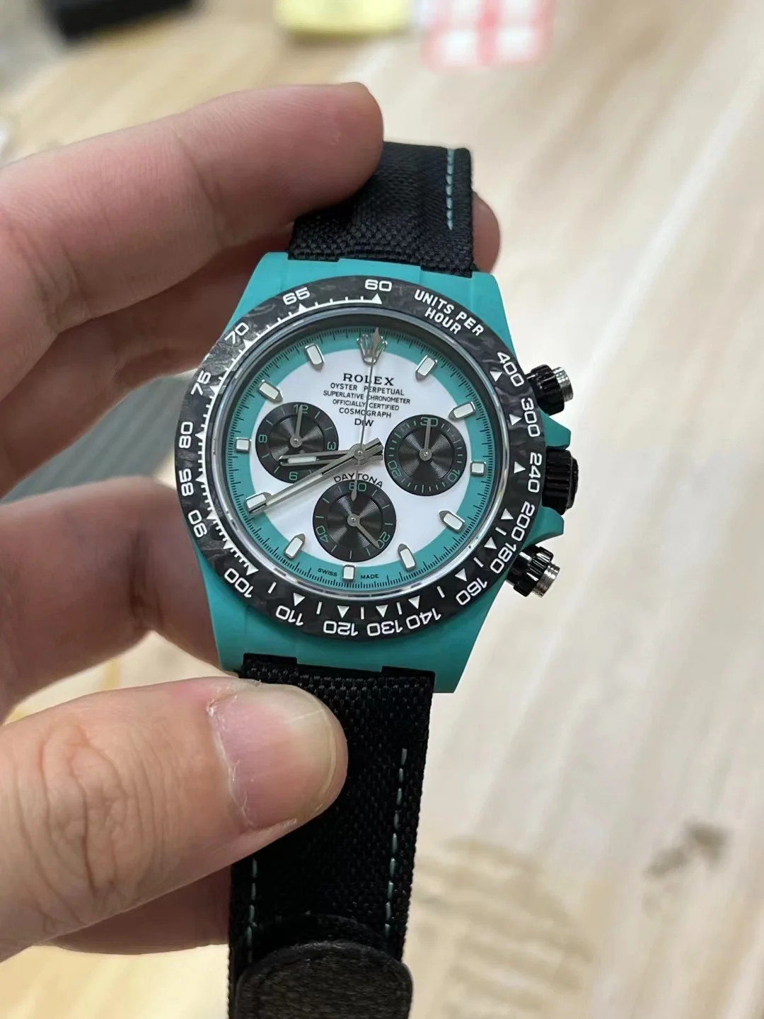 Rolex Carbon — photographed off the sweep