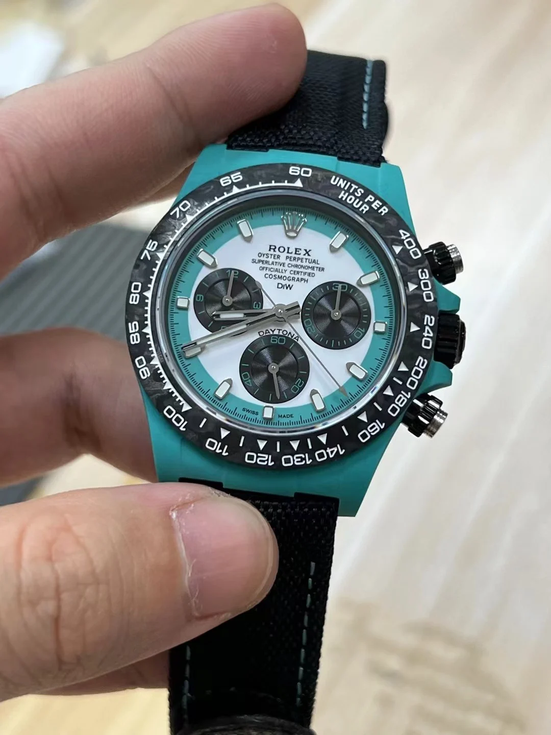Rolex Carbon — photographed off the sweep