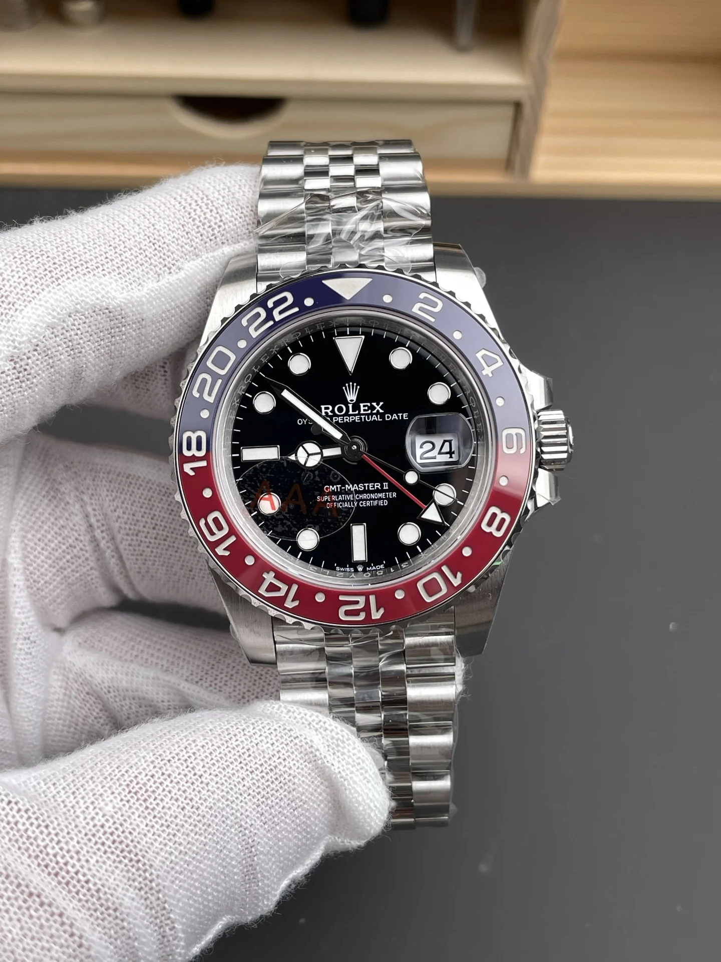 Rolex Coke 40mm — photographed off the sweep