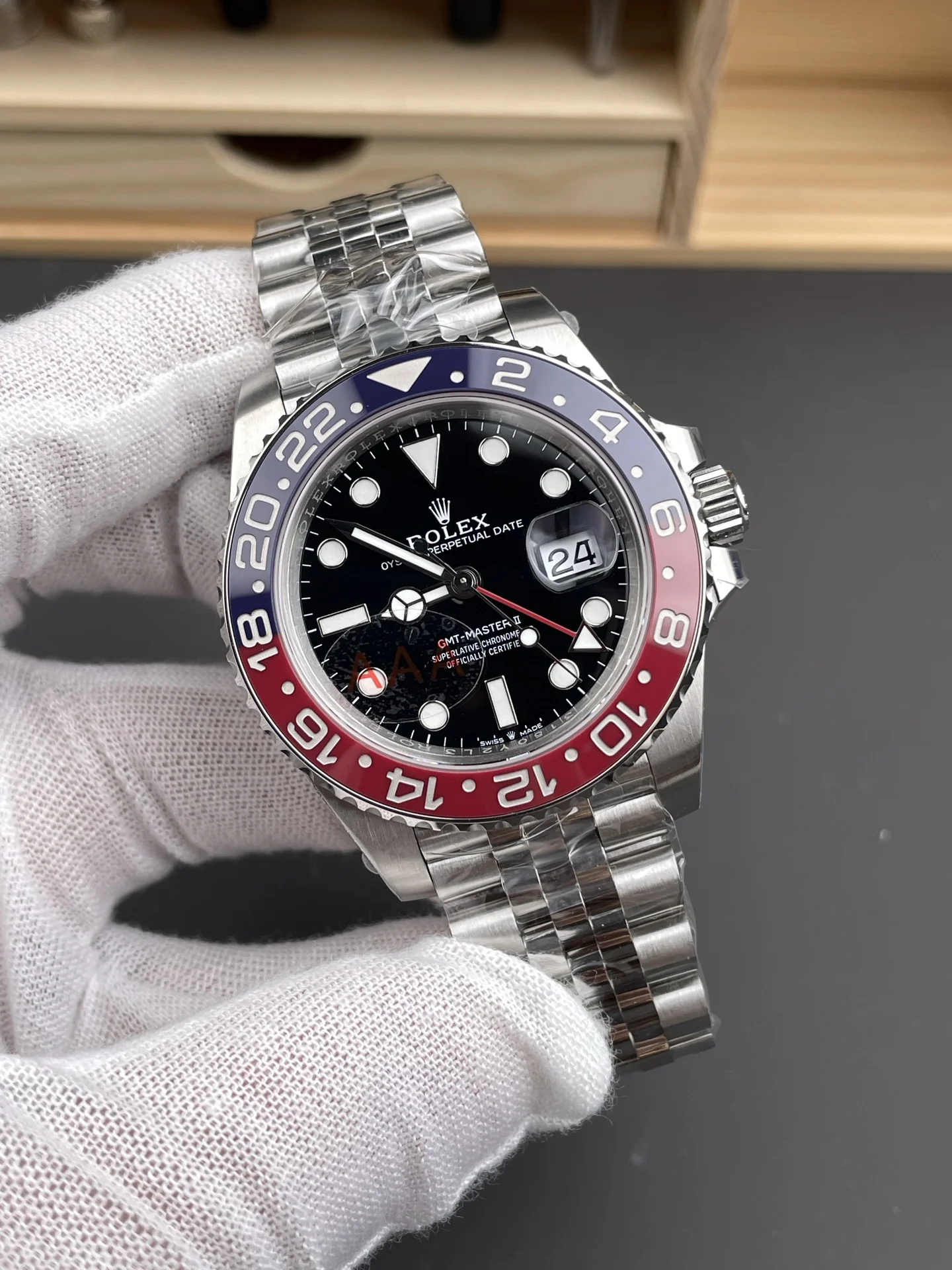 Rolex Coke 40mm — photographed off the sweep