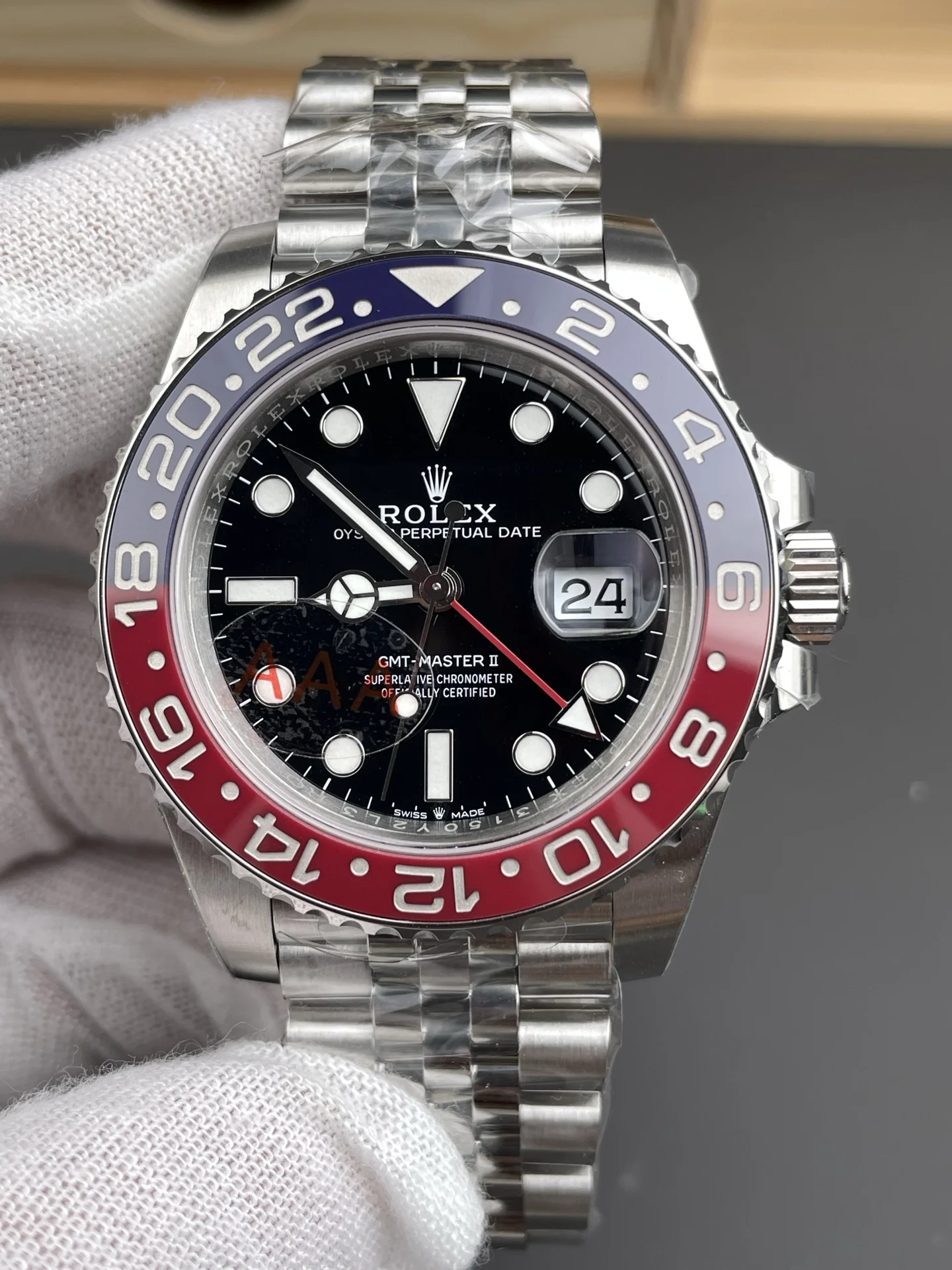 Rolex Coke 40mm — photographed off the sweep