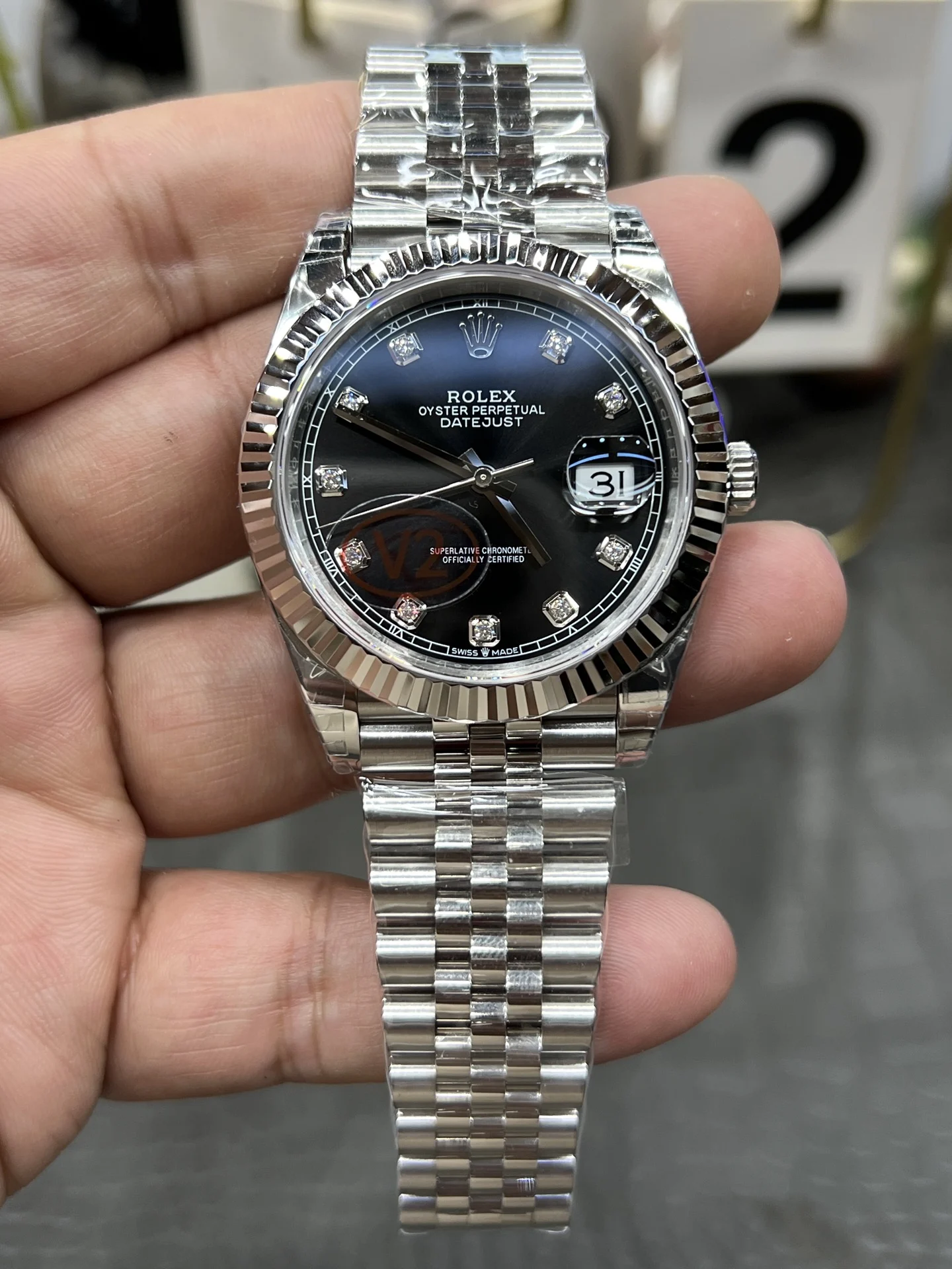 Rolex Datejust Black Dial Diamond-Set 41mm — photographed off the sweep