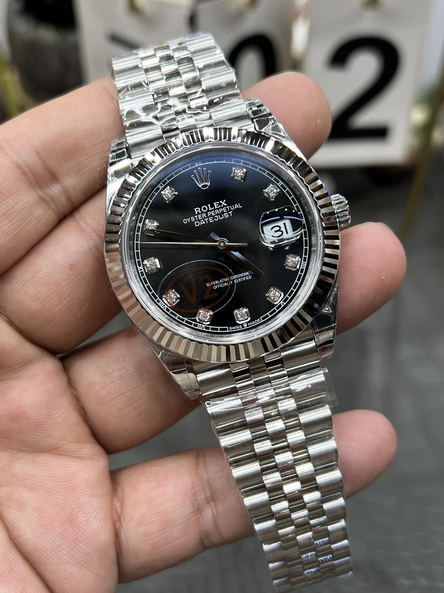Rolex Datejust Black Dial Diamond-Set 41mm — photographed off the sweep