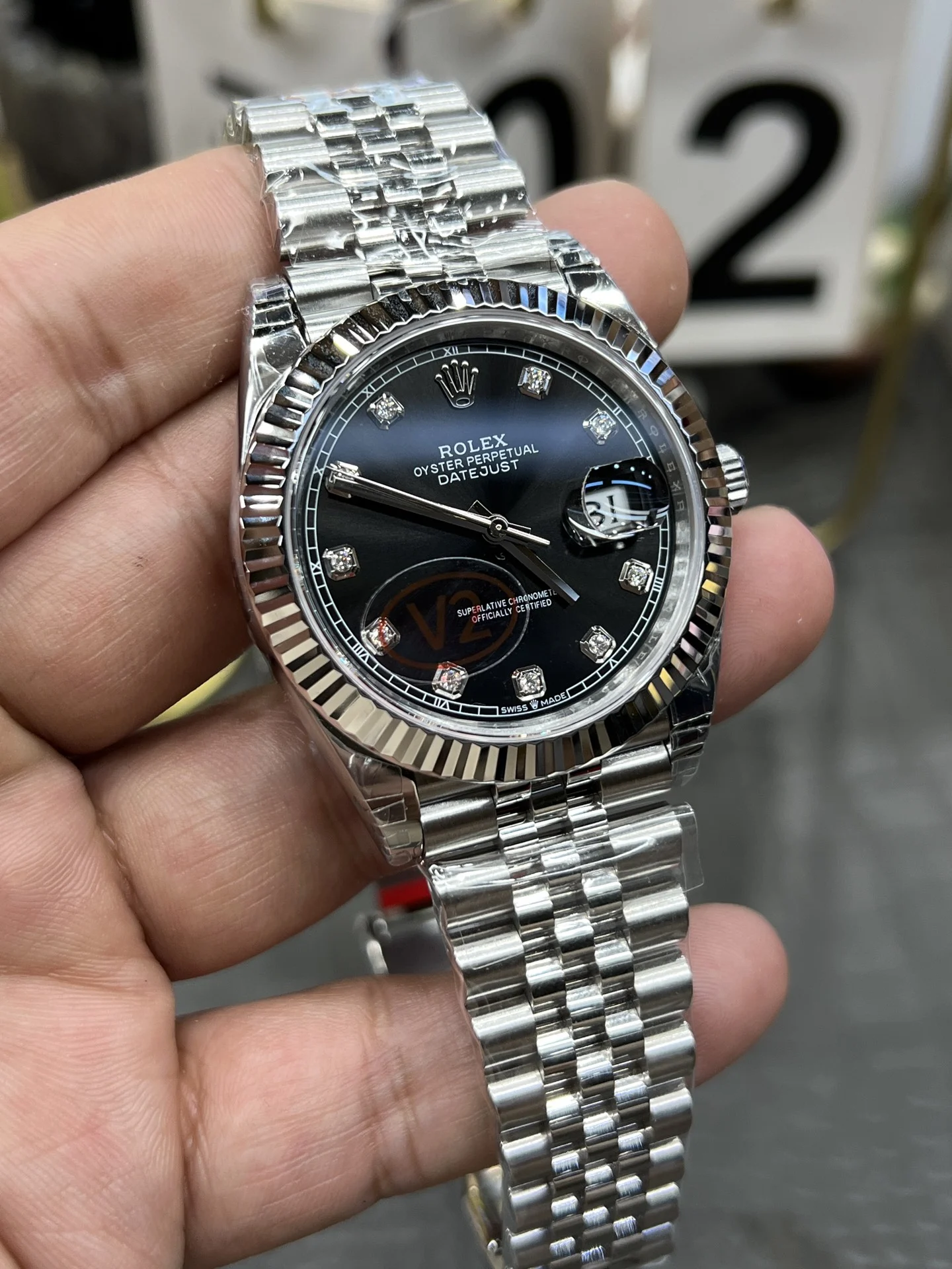 Rolex Datejust Black Dial Diamond-Set 41mm — photographed off the sweep