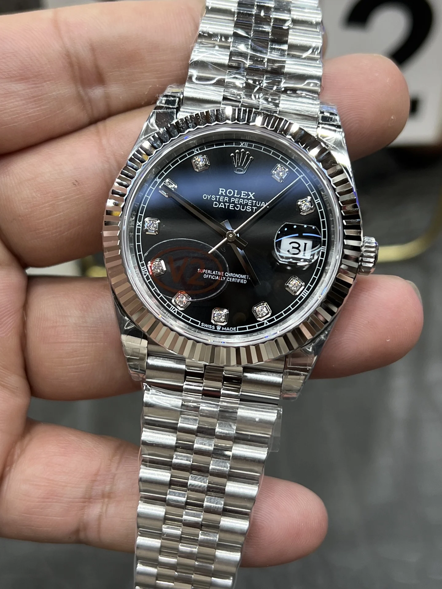Rolex Datejust Black Dial Diamond-Set 41mm — photographed off the sweep