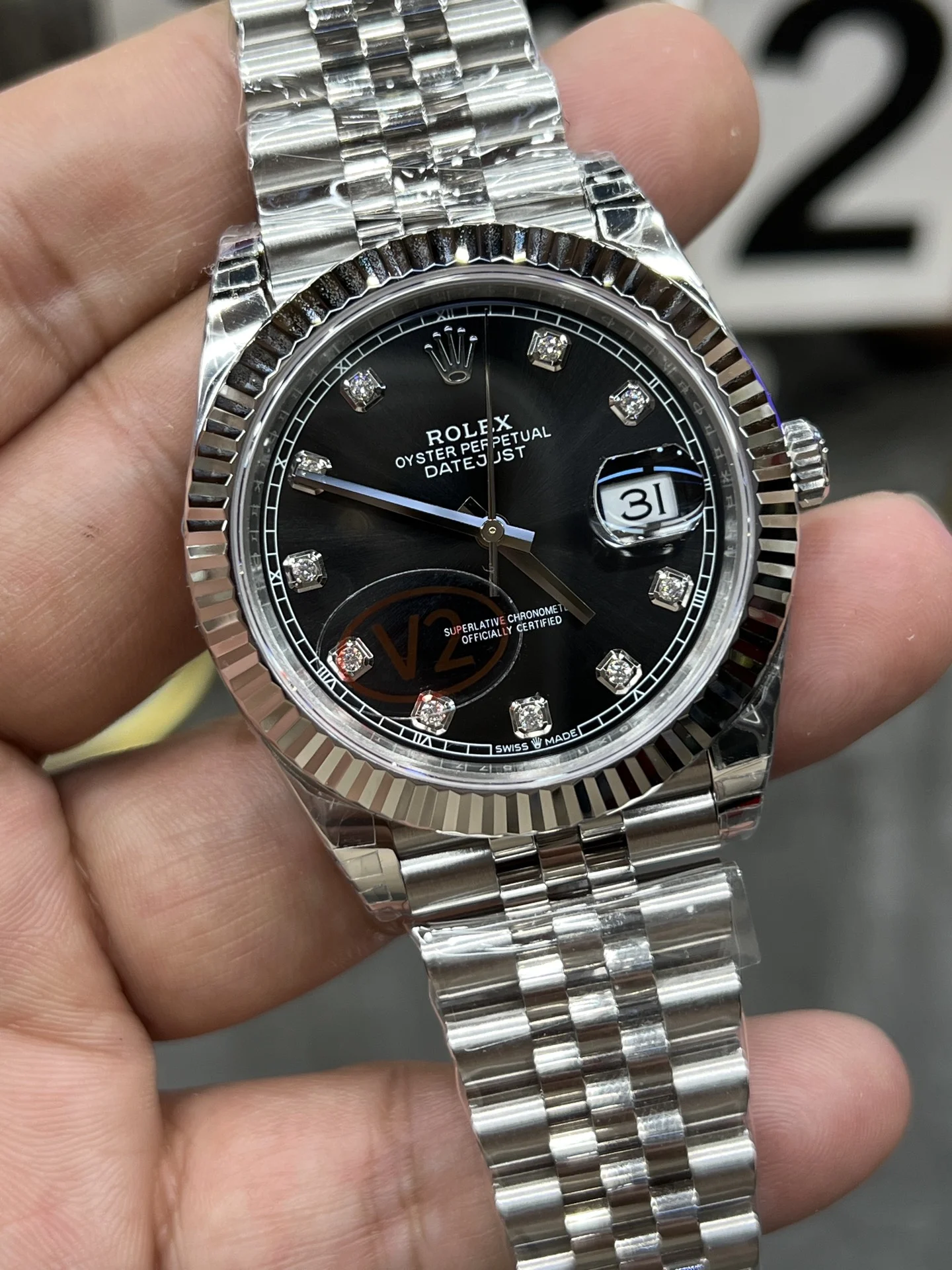 Rolex Datejust Black Dial Diamond-Set 41mm — photographed off the sweep