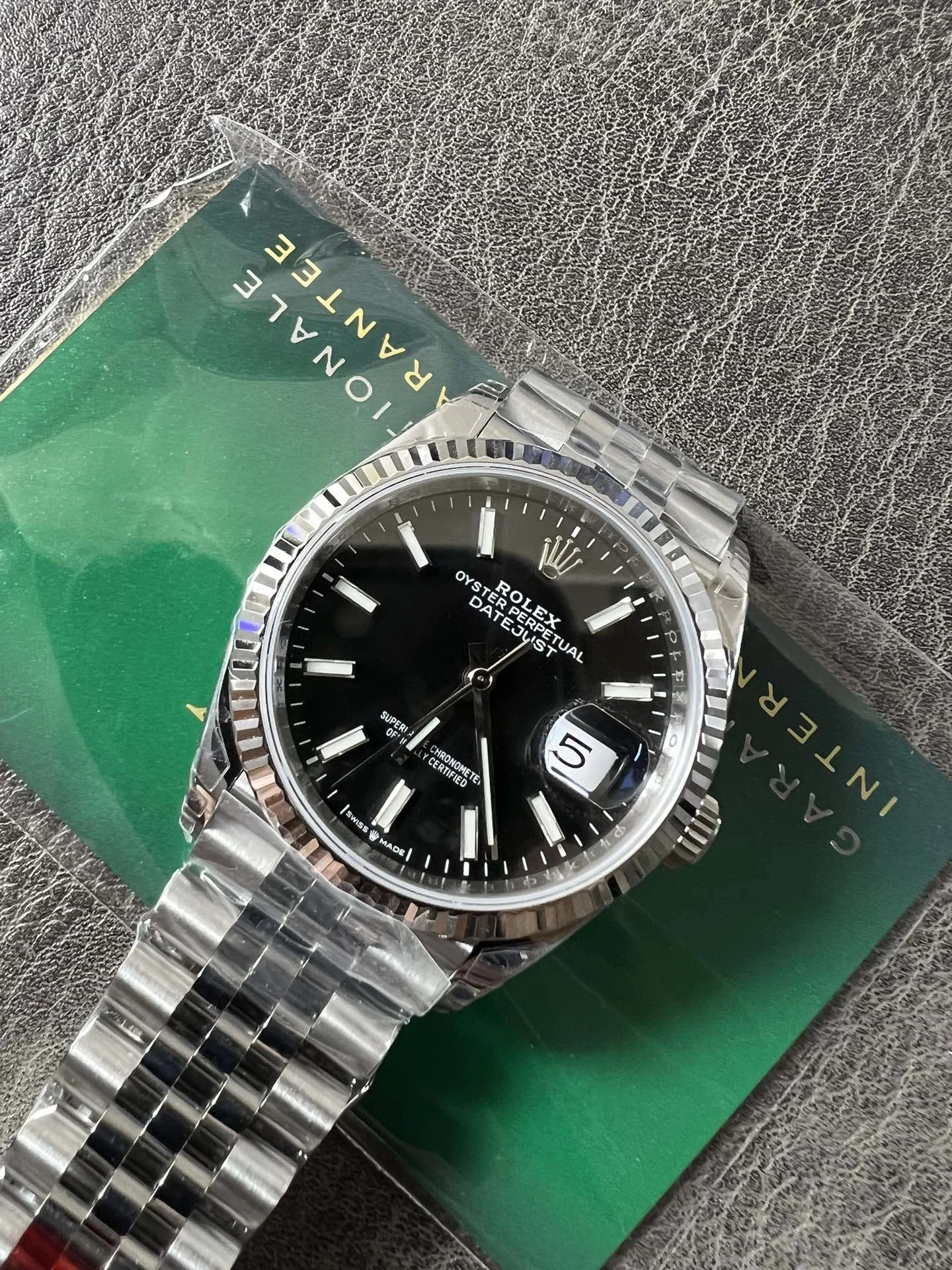 Rolex Datejust Black Dial — photographed off the sweep