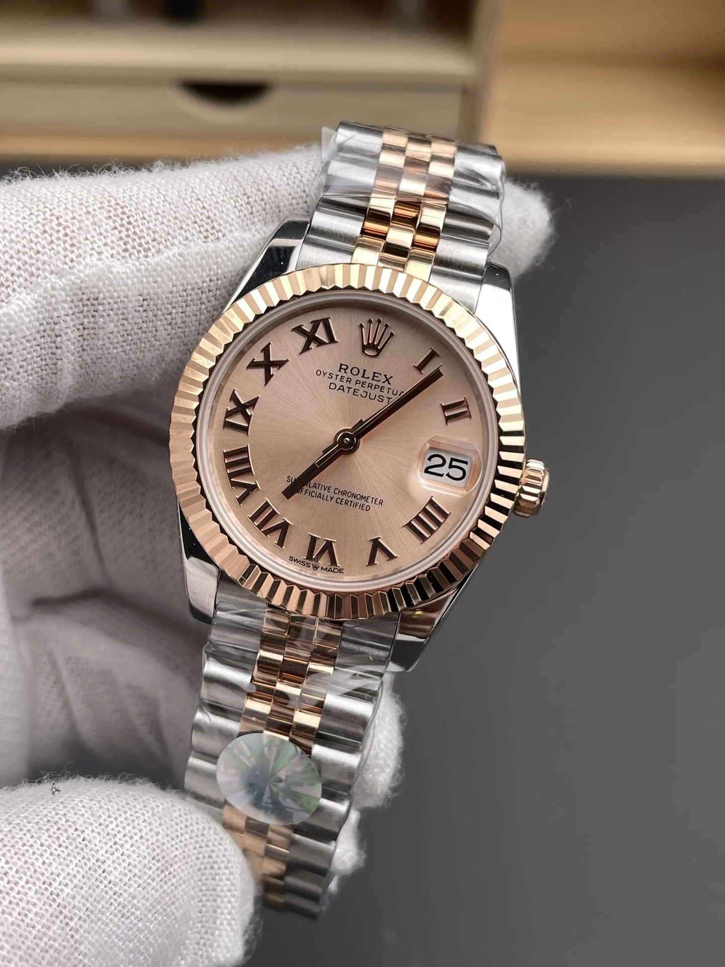 Rolex Datejust Champagne Rose Gold 31mm — photographed off the sweep