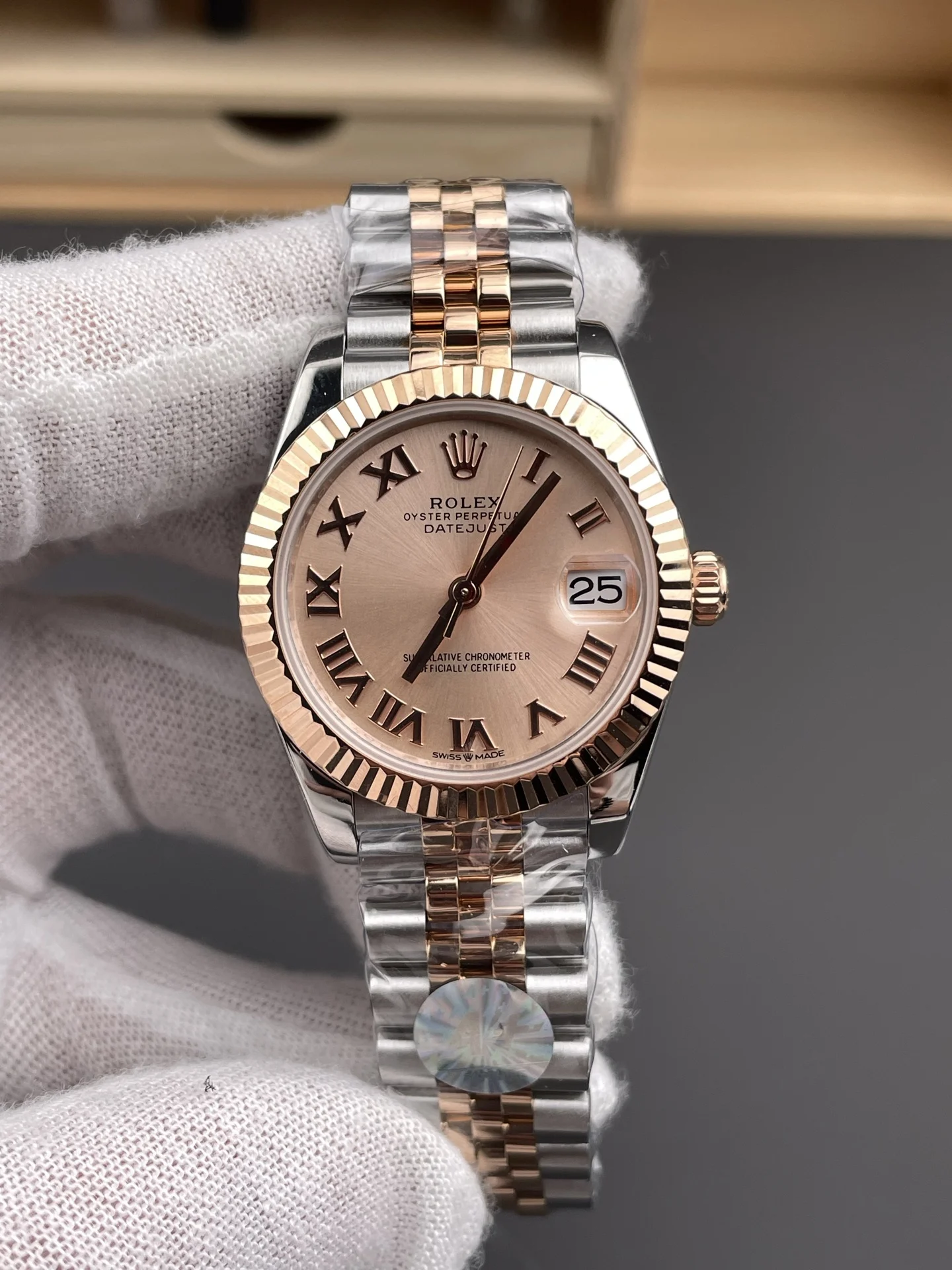 Rolex Datejust Champagne Rose Gold 31mm — photographed off the sweep