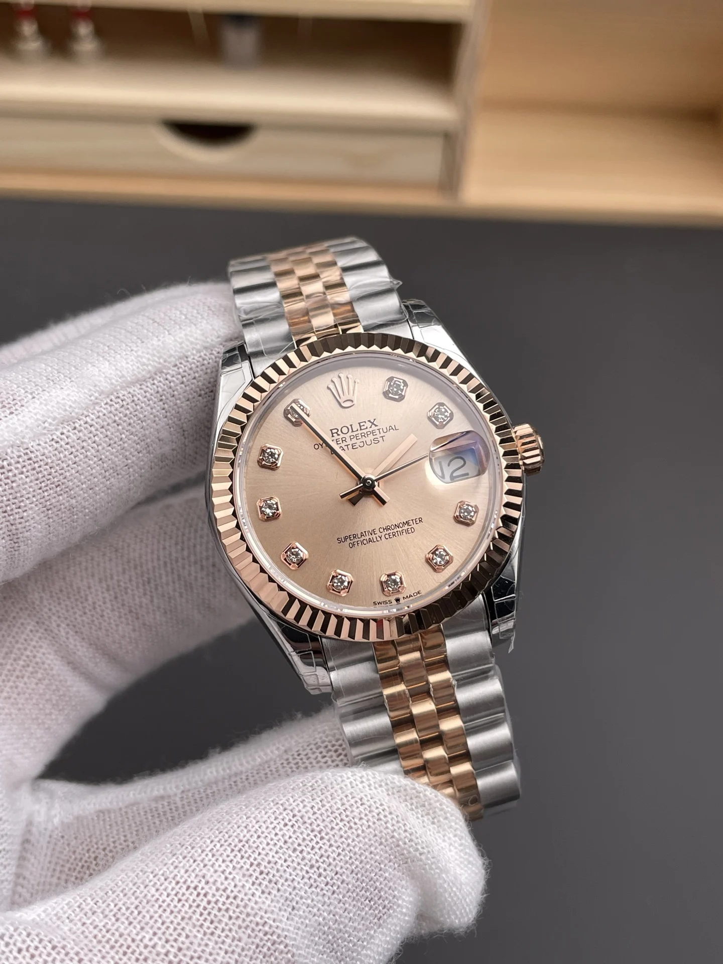 Rolex Datejust Champagne Two-Tone 31mm — photographed off the sweep