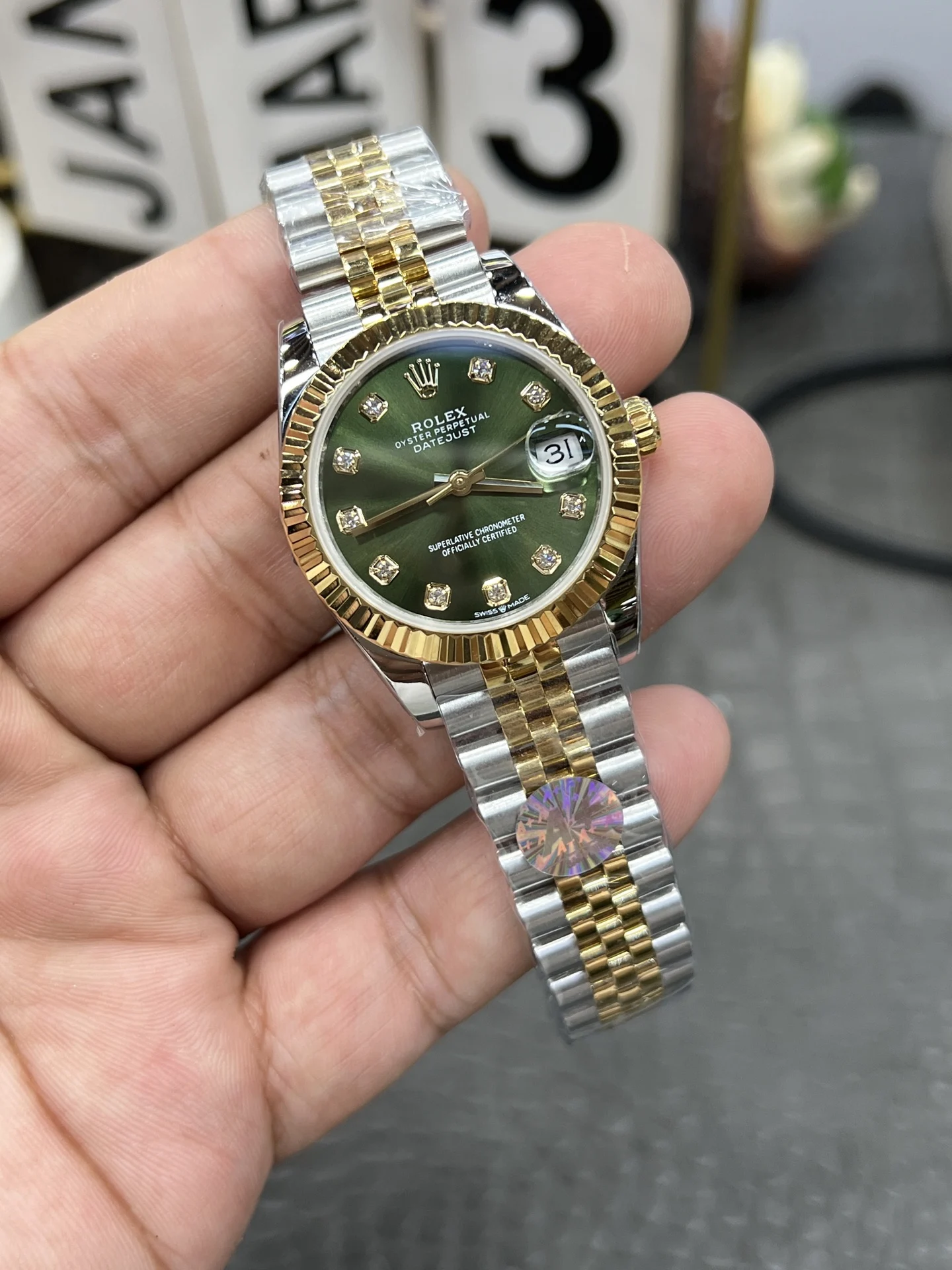 Rolex Datejust Green Dial 31mm — photographed off the sweep