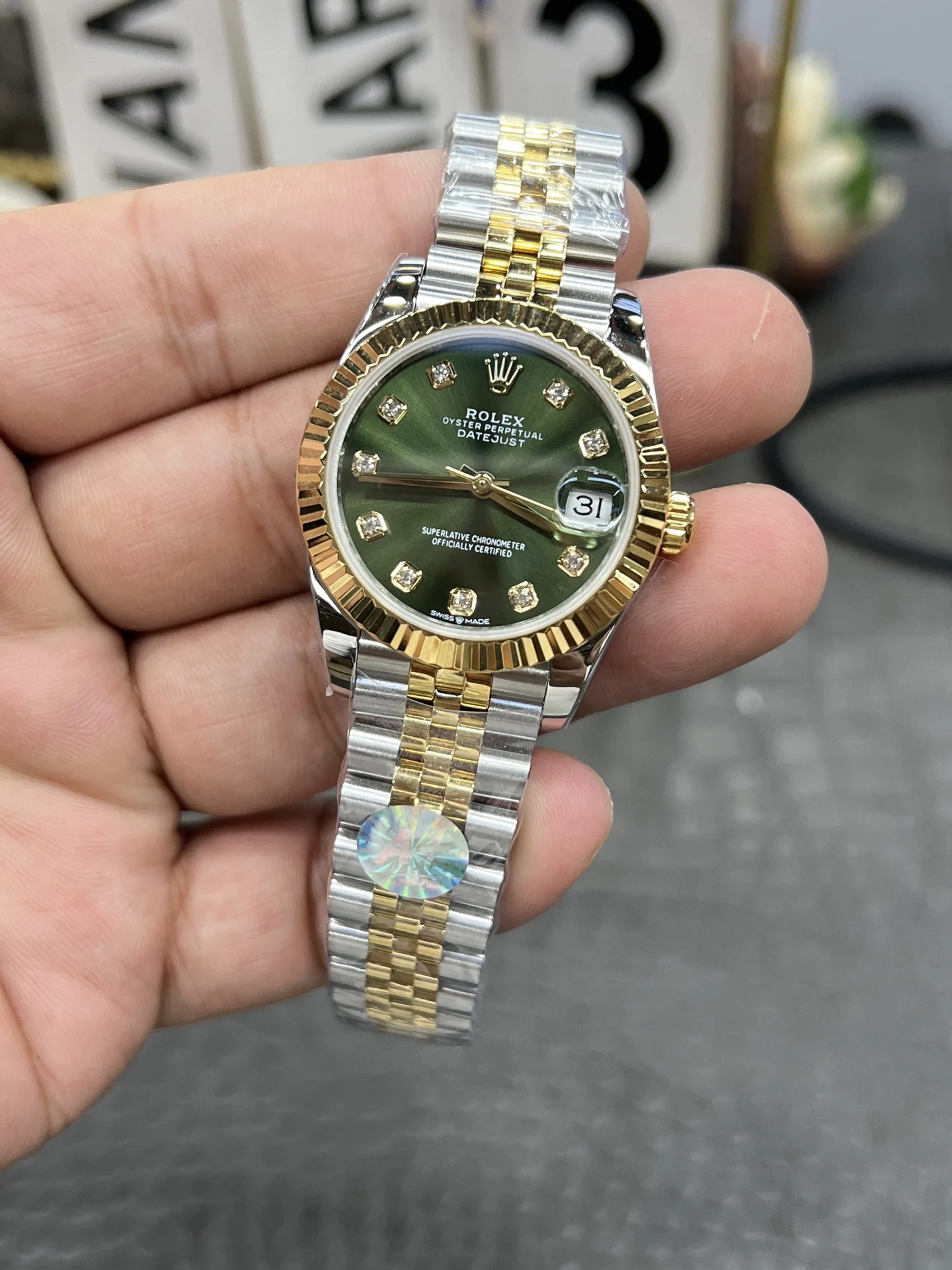 Rolex Datejust Green Dial 31mm — photographed off the sweep