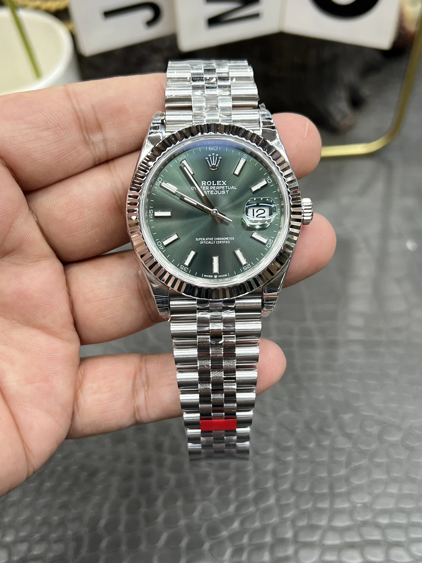 Rolex Datejust Green Dial 41mm — photographed off the sweep