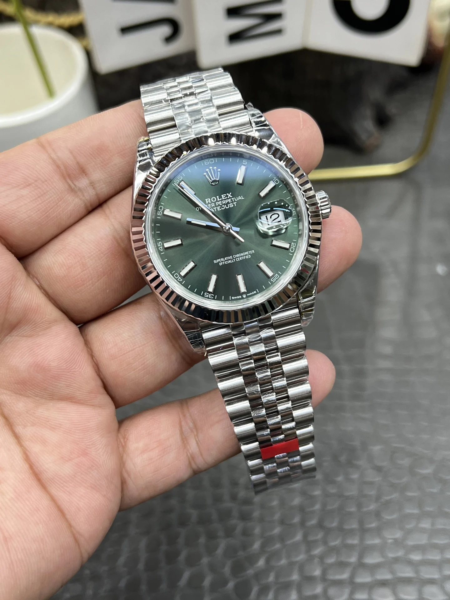 Rolex Datejust Green Dial 41mm — photographed off the sweep