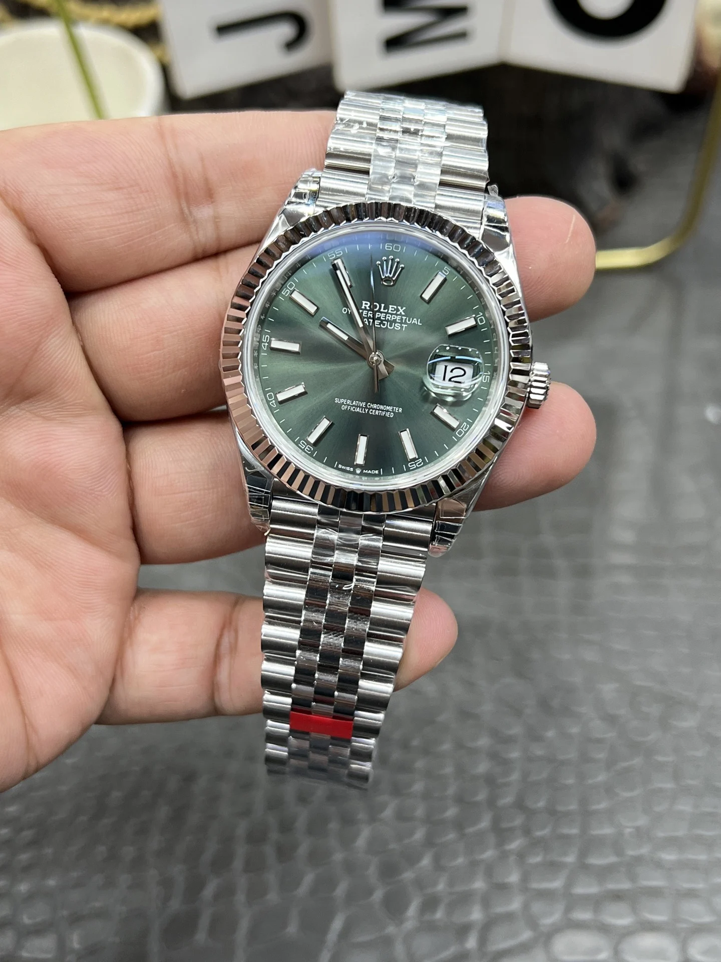 Rolex Datejust Green Dial 41mm — photographed off the sweep