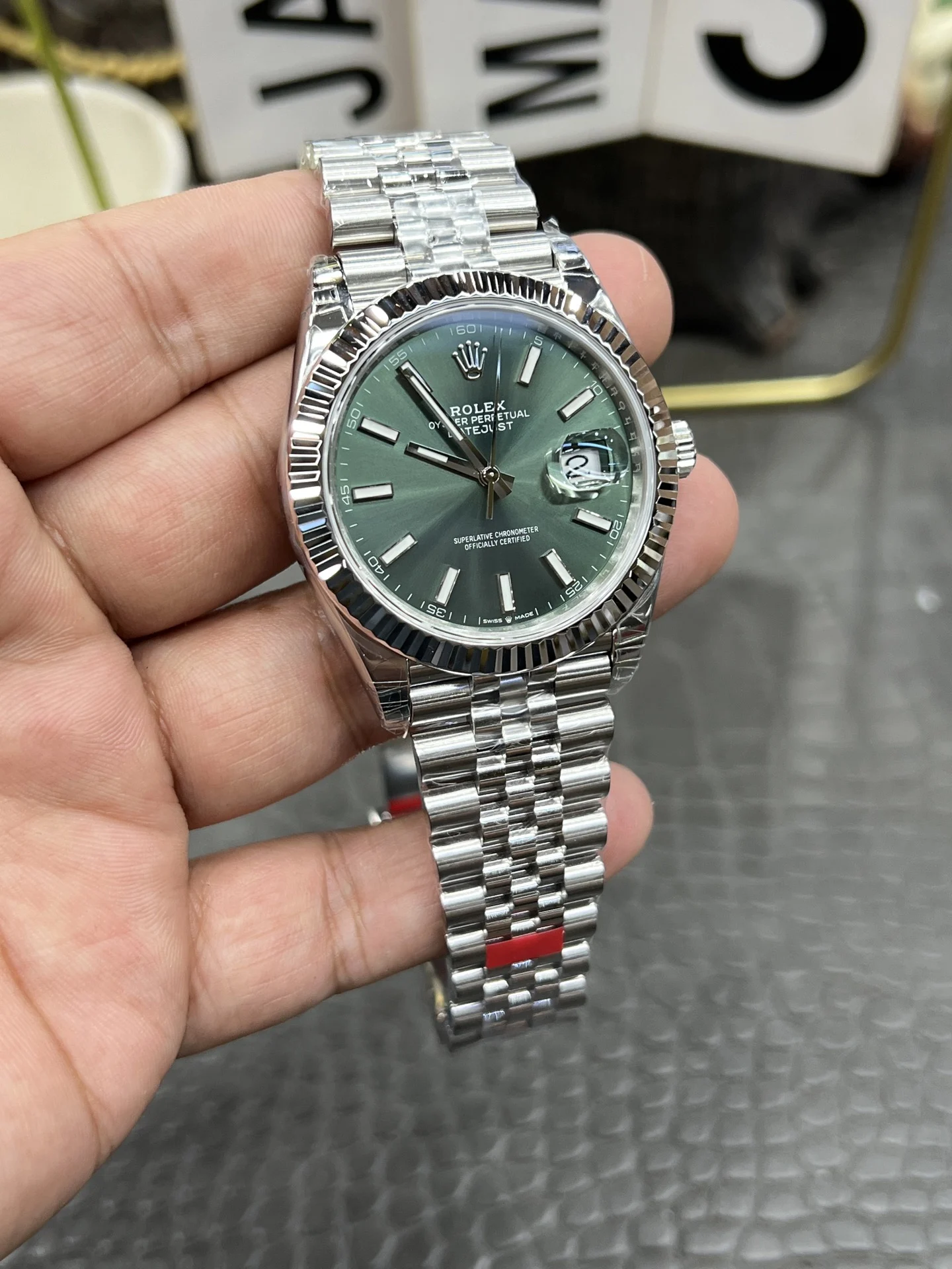 Rolex Datejust Green Dial 41mm — photographed off the sweep