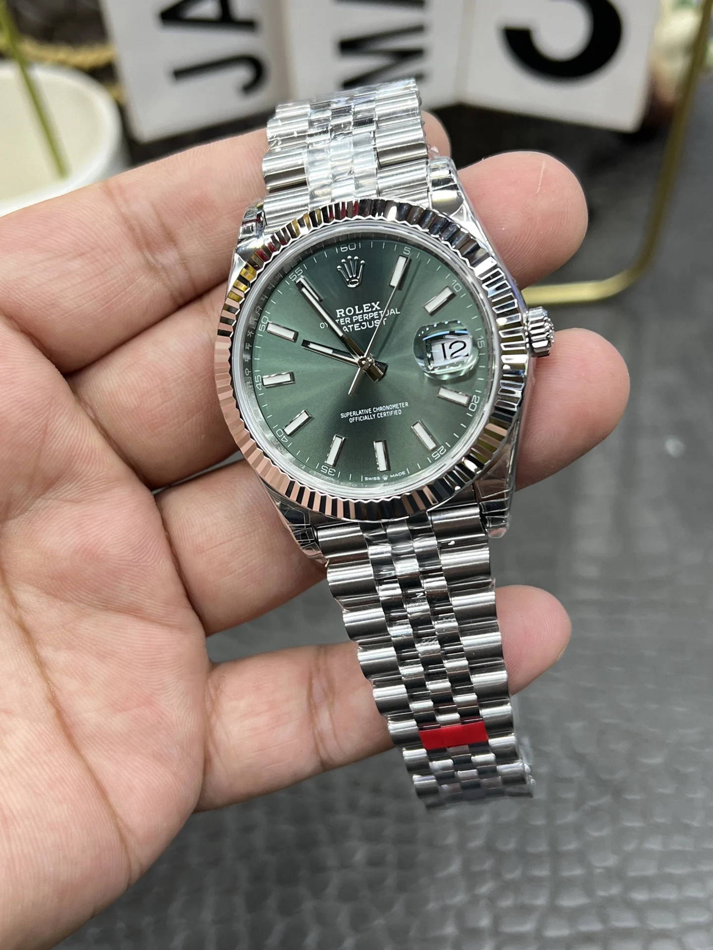 Rolex Datejust Green Dial 41mm — photographed off the sweep