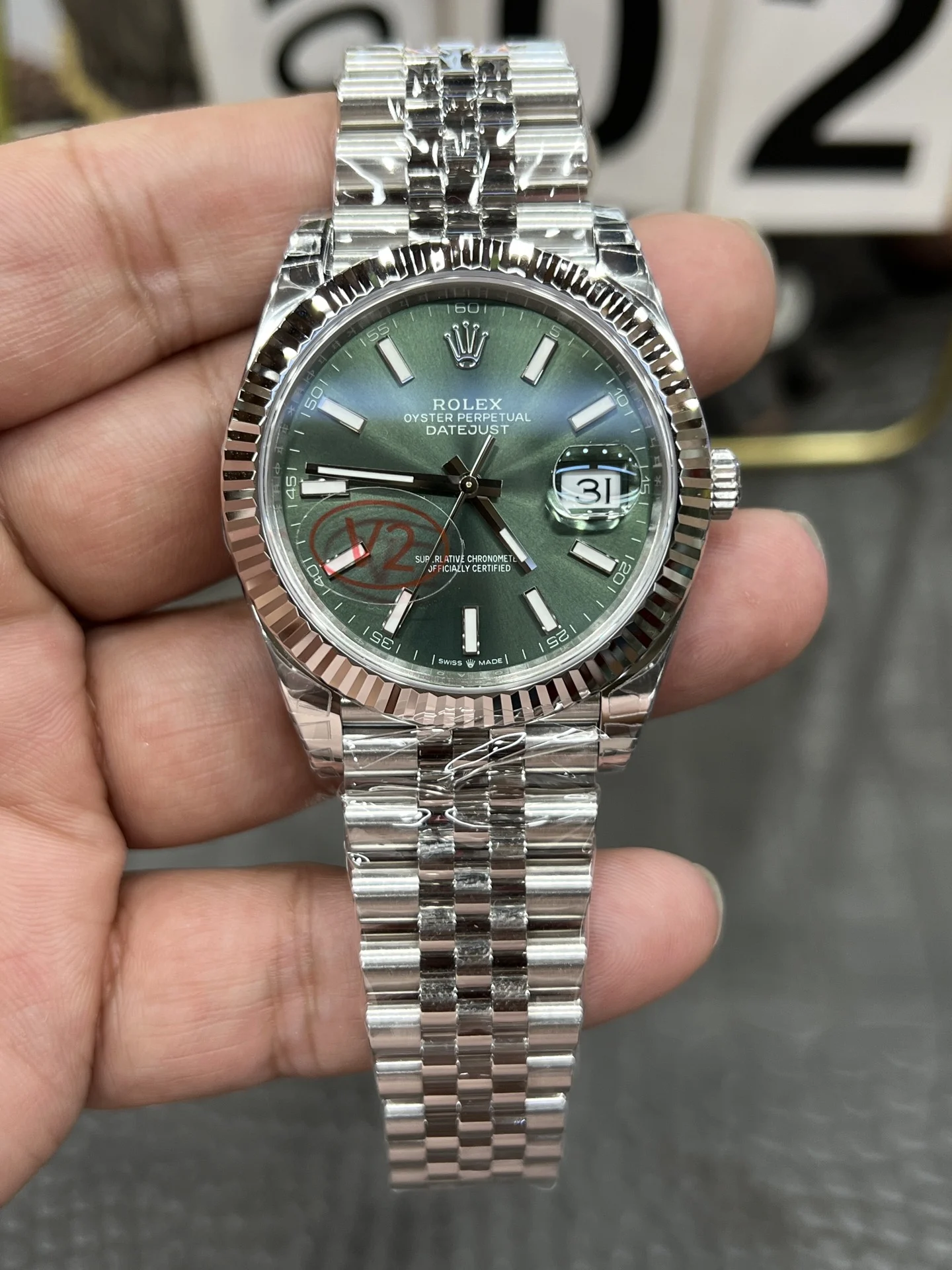 Rolex Datejust Green Dial 41mm — photographed off the sweep