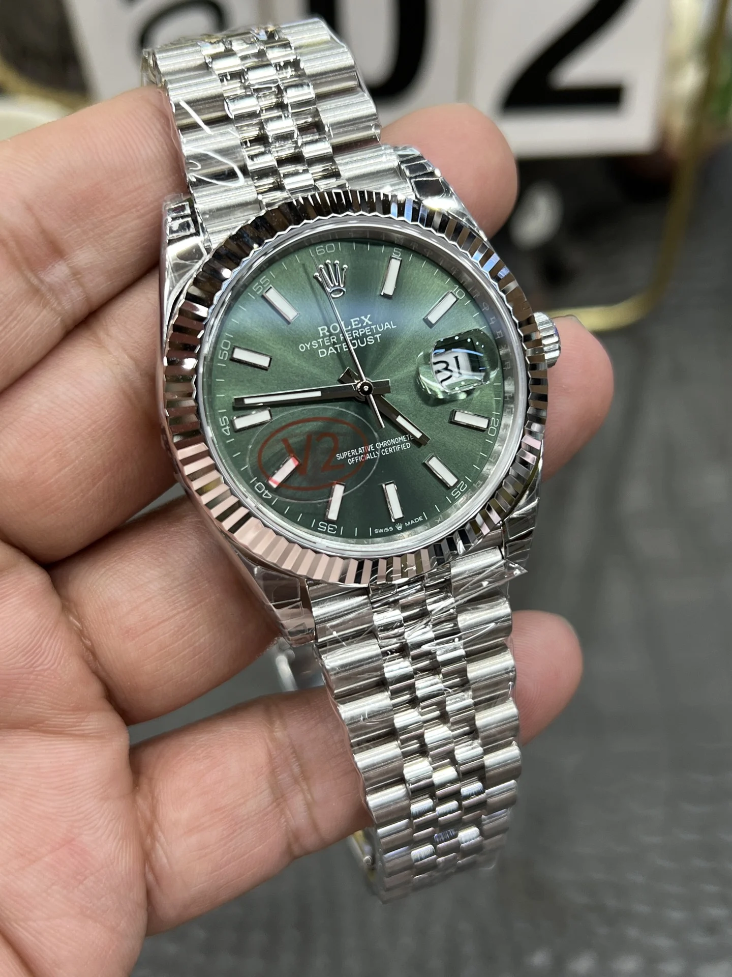Rolex Datejust Green Dial 41mm — photographed off the sweep
