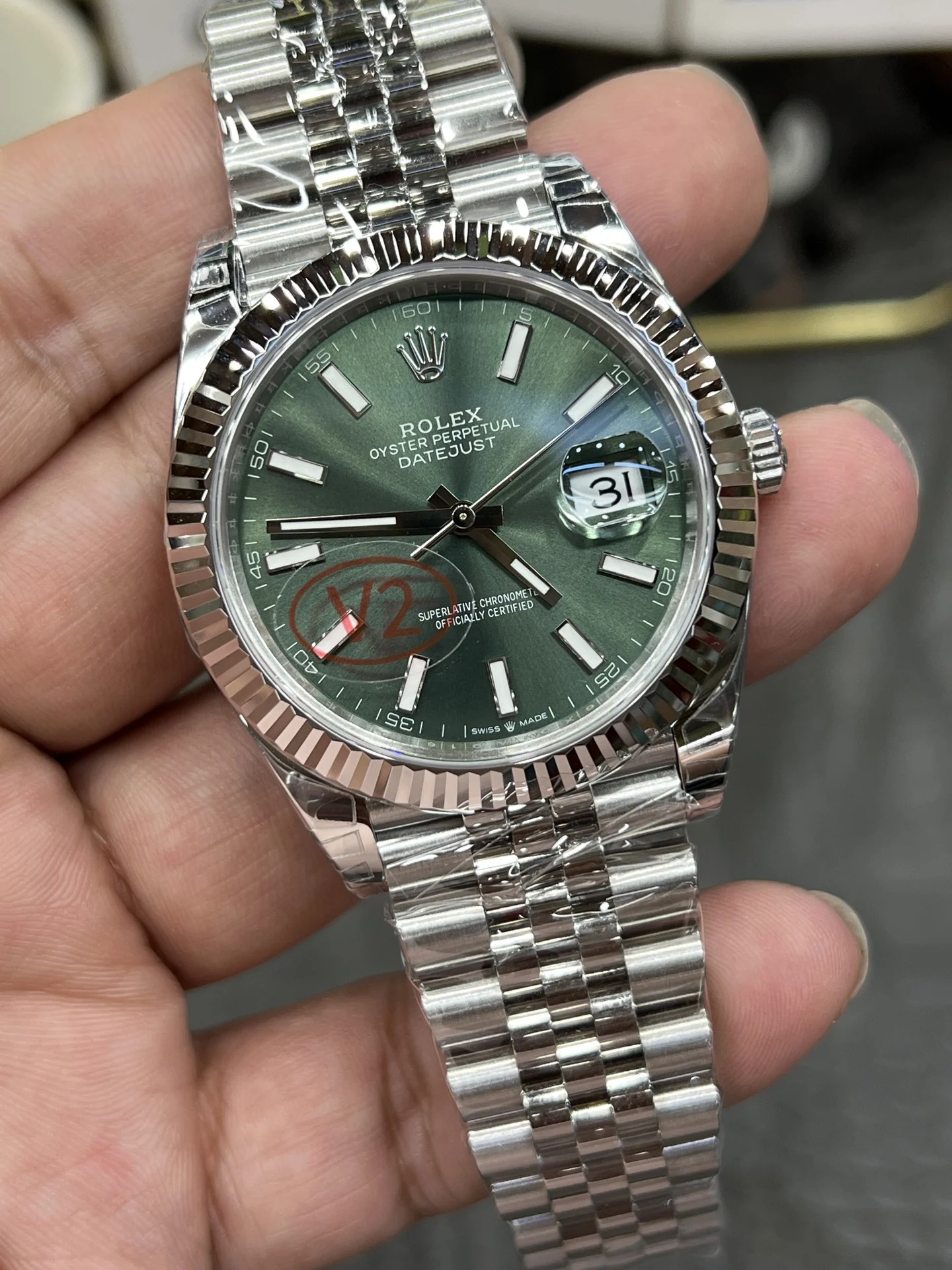 Rolex Datejust Green Dial 41mm — photographed off the sweep