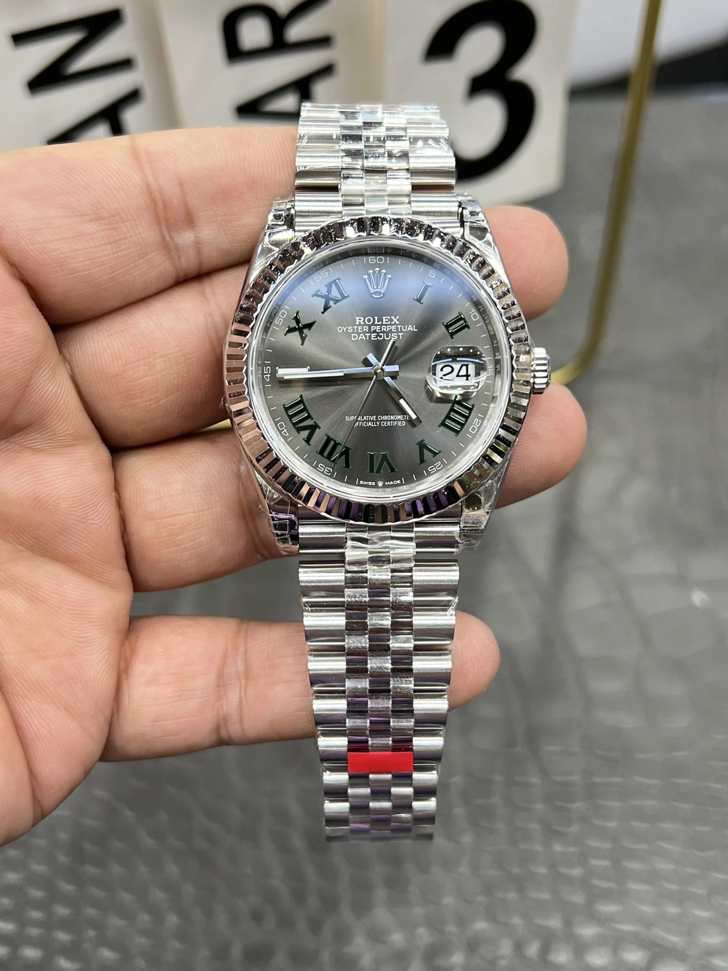 Rolex Datejust Green Dial 41mm — photographed off the sweep