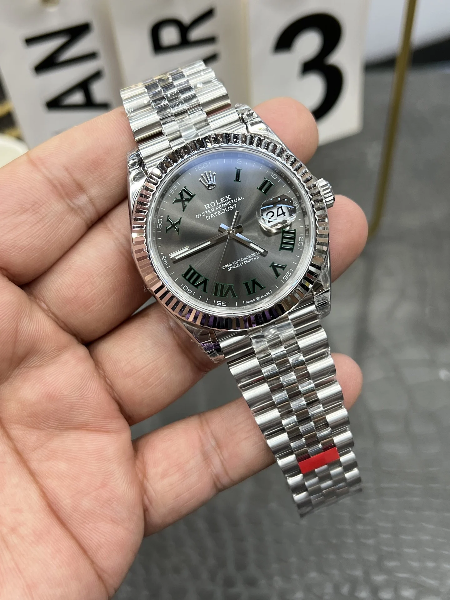 Rolex Datejust Green Dial 41mm — photographed off the sweep