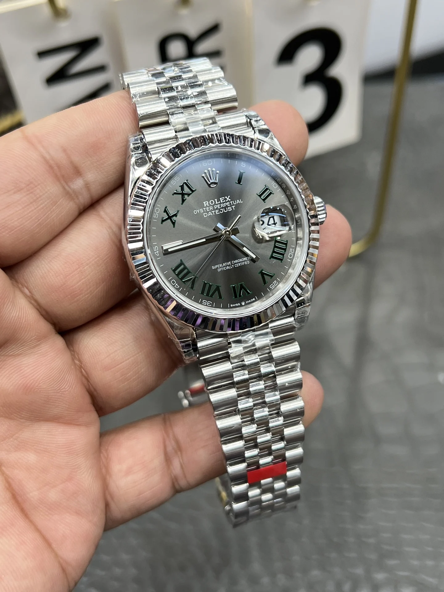 Rolex Datejust Green Dial 41mm — photographed off the sweep