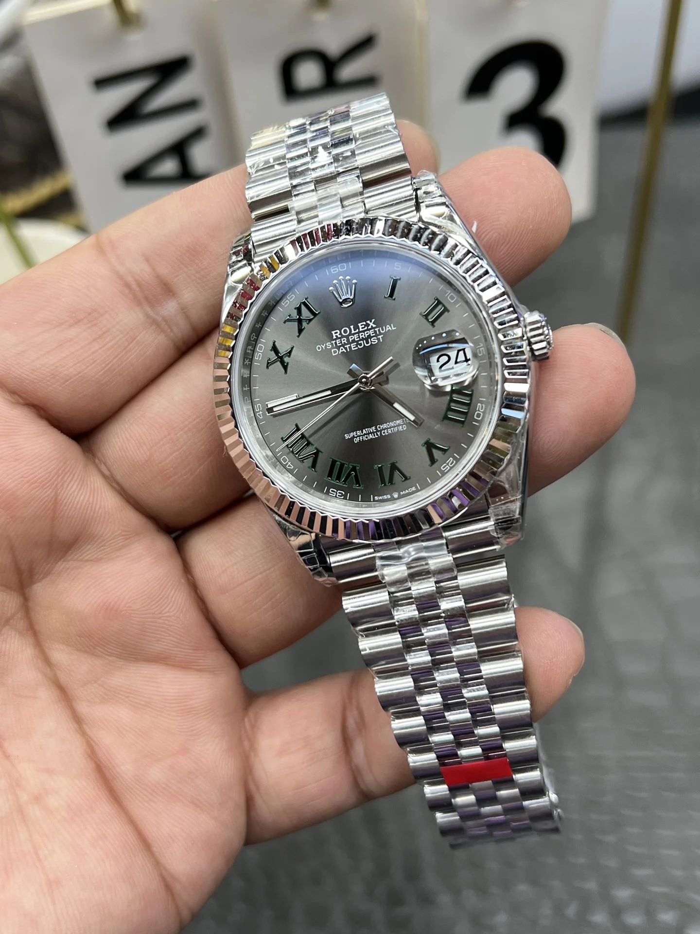 Rolex Datejust Green Dial 41mm — photographed off the sweep