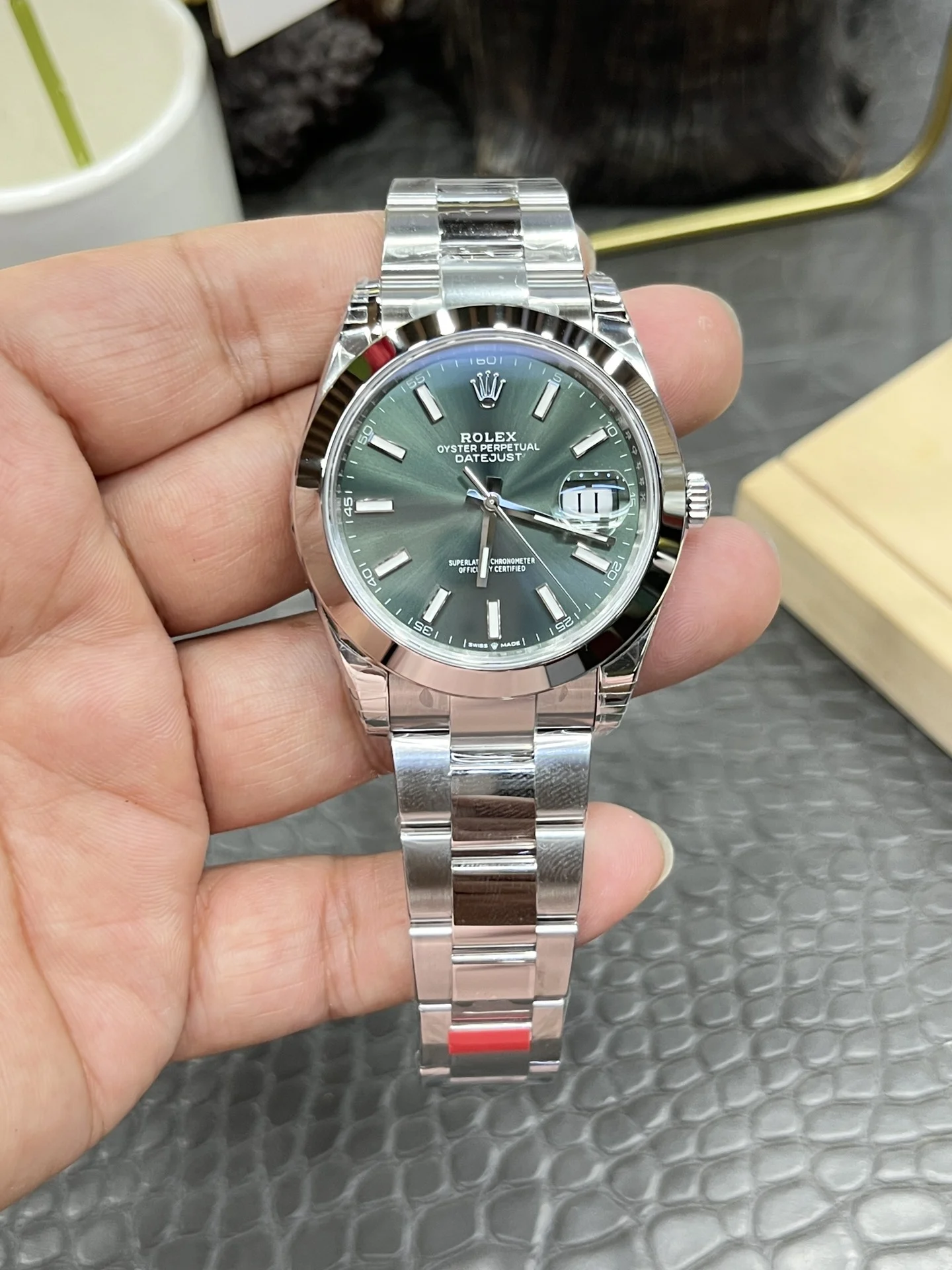 Rolex Datejust Green Dial 41mm — photographed off the sweep
