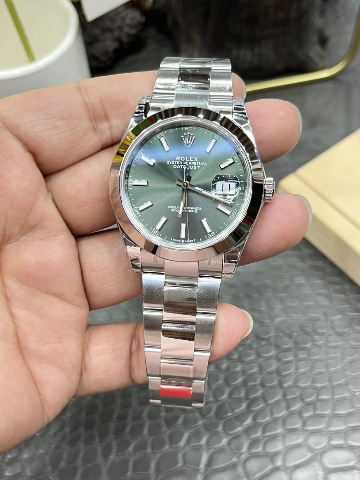 Rolex Datejust Green Dial 41mm — photographed off the sweep