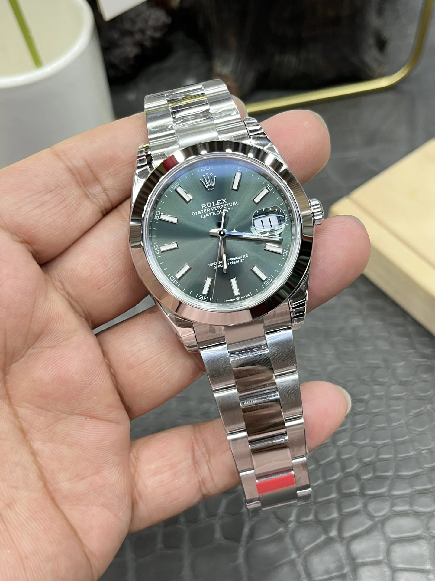 Rolex Datejust Green Dial 41mm — photographed off the sweep