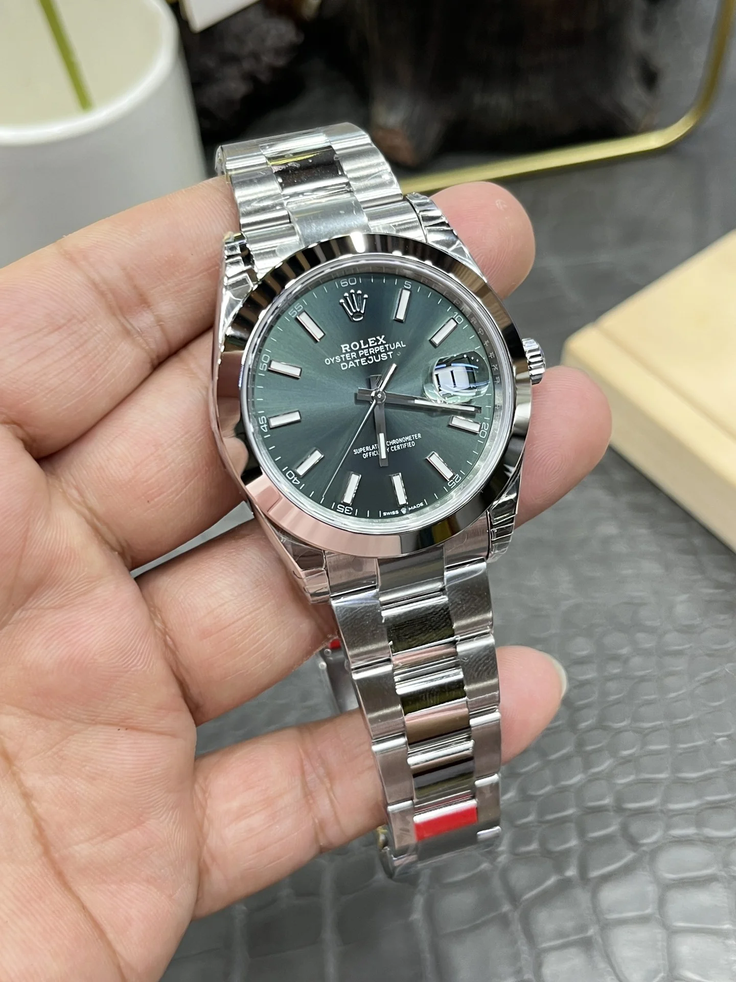 Rolex Datejust Green Dial 41mm — photographed off the sweep
