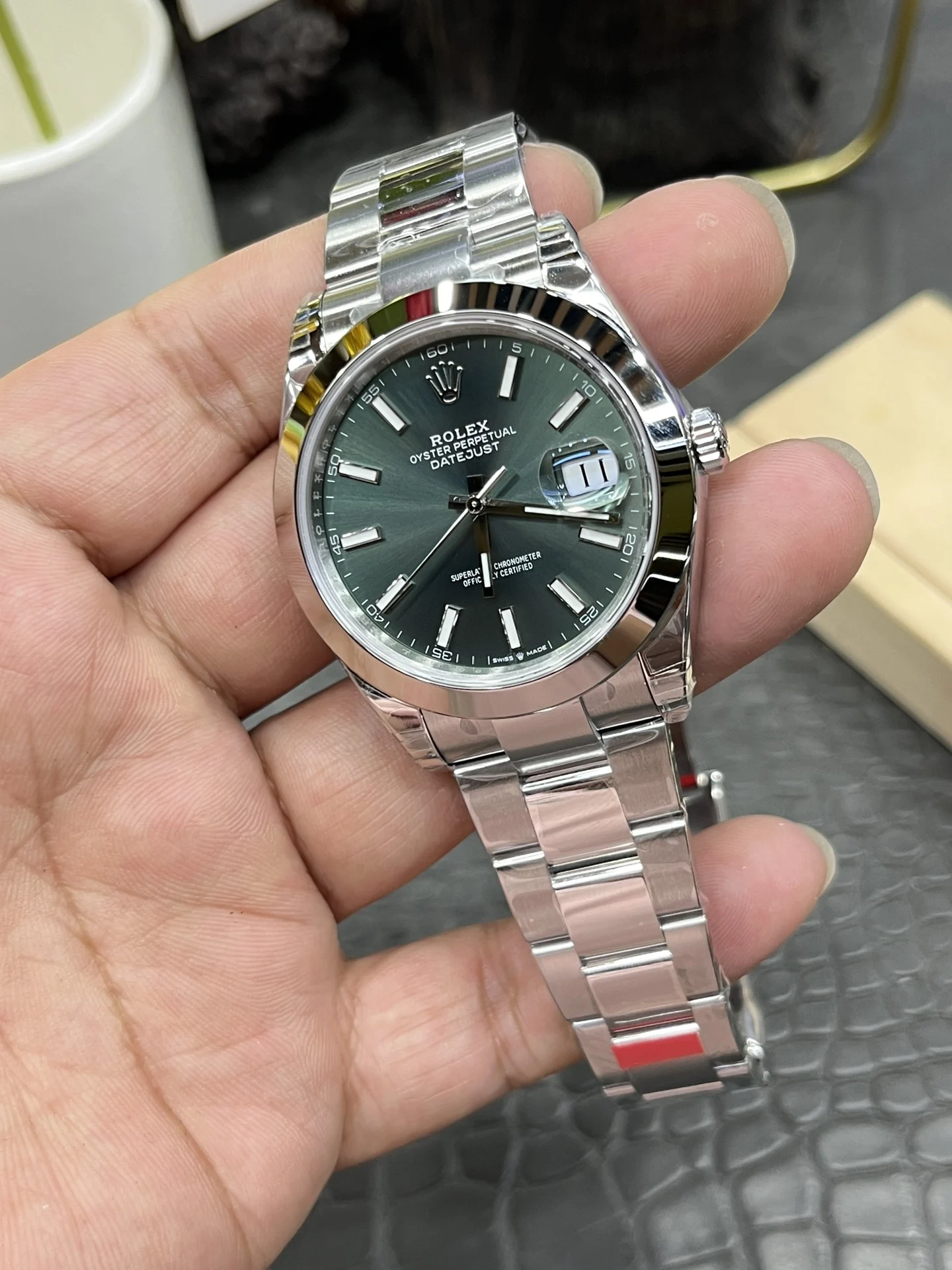 Rolex Datejust Green Dial 41mm — photographed off the sweep