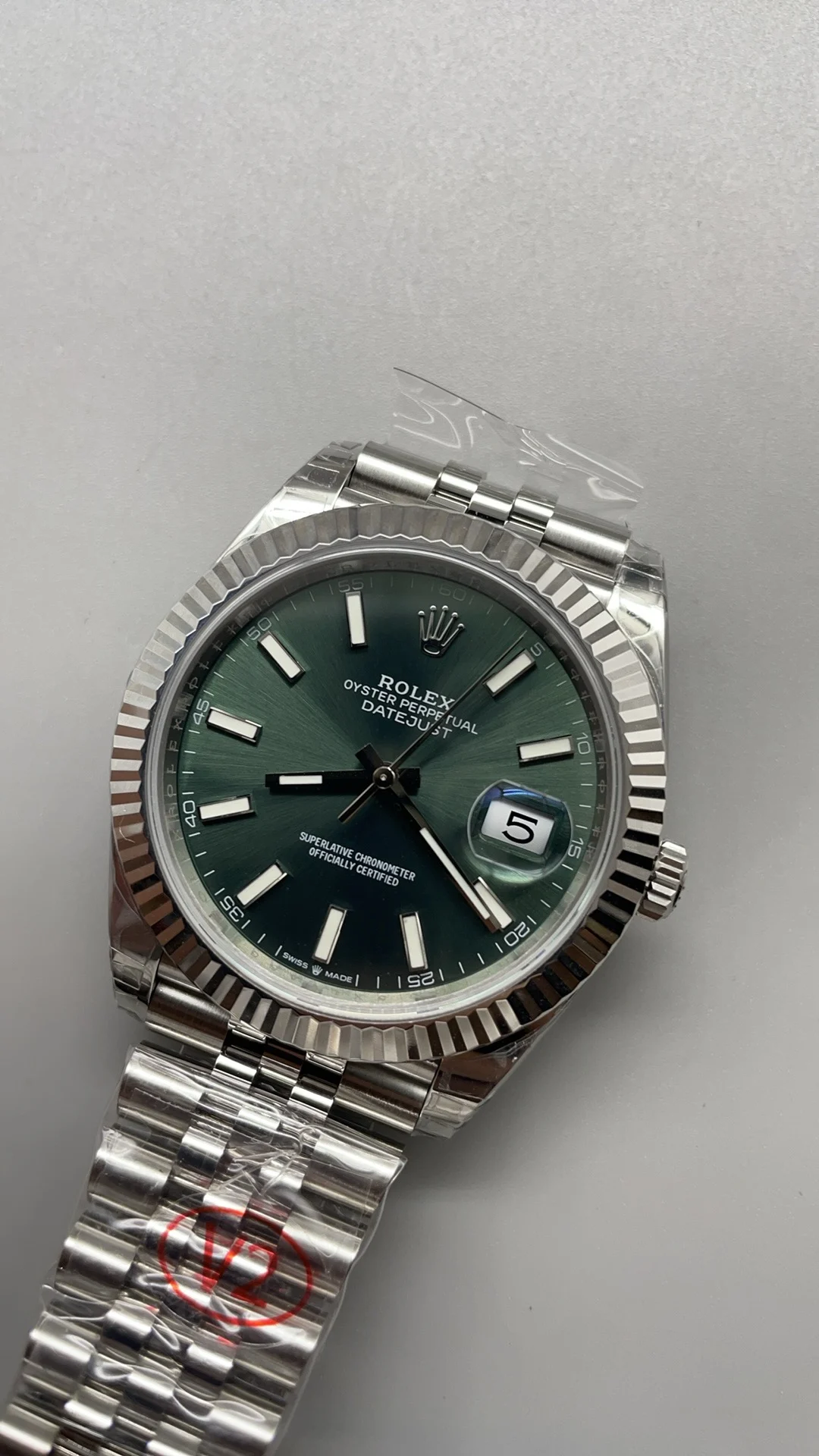 Rolex Datejust Green Dial 41mm — photographed off the sweep