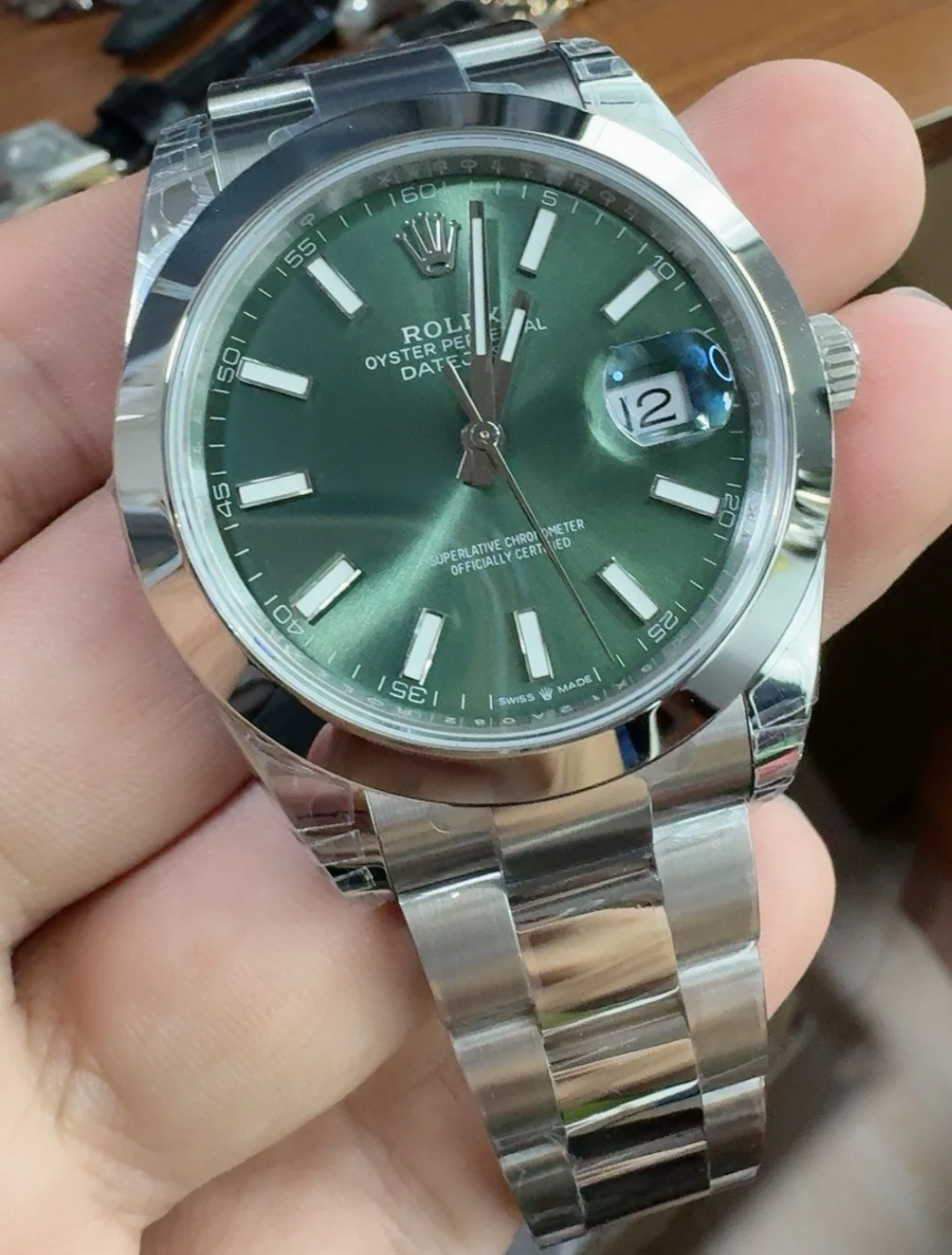 Rolex Datejust Green Dial 41mm — photographed off the sweep